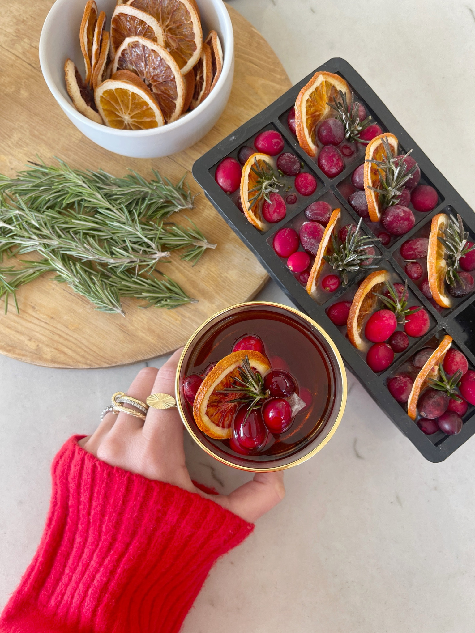 HOLIDAY \ festive Christmas cocktail with these large fancy ice cubes!

Party
Entertaining
Kitchen 
Home Decor 
Sweater 

#LTKhome #LTKHoliday #LTKparties