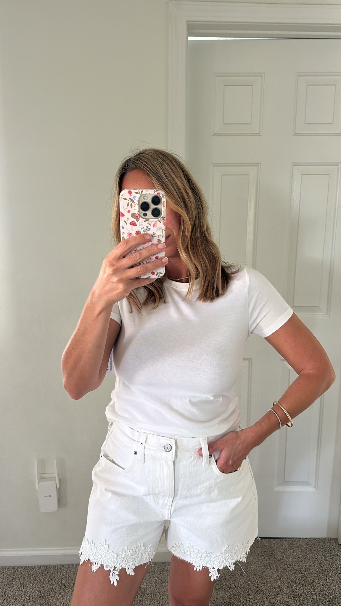 White denim shorts from Old Navy with embroidery so cute for summer and my favorite white tee

#LTKOver40
