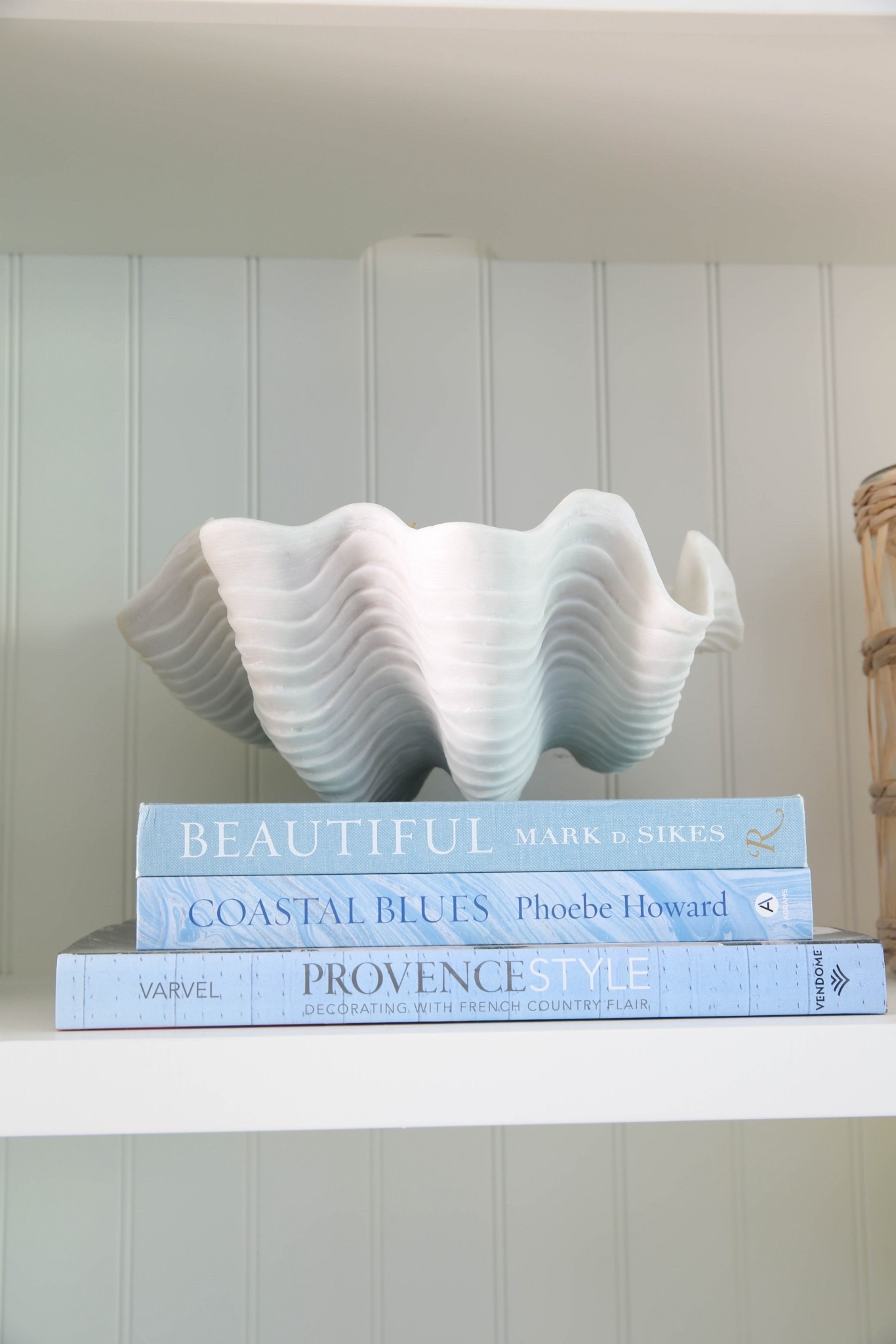 My shelf decor features coastal coffee table books and a decorative shell bowl for a clean, layered, designer-inspired coastal look. I love how blue and white accents mixed with natural textures make these shelves feel styled but not cluttered. 



#LTKSaleAlert #LTKU #LTKHome