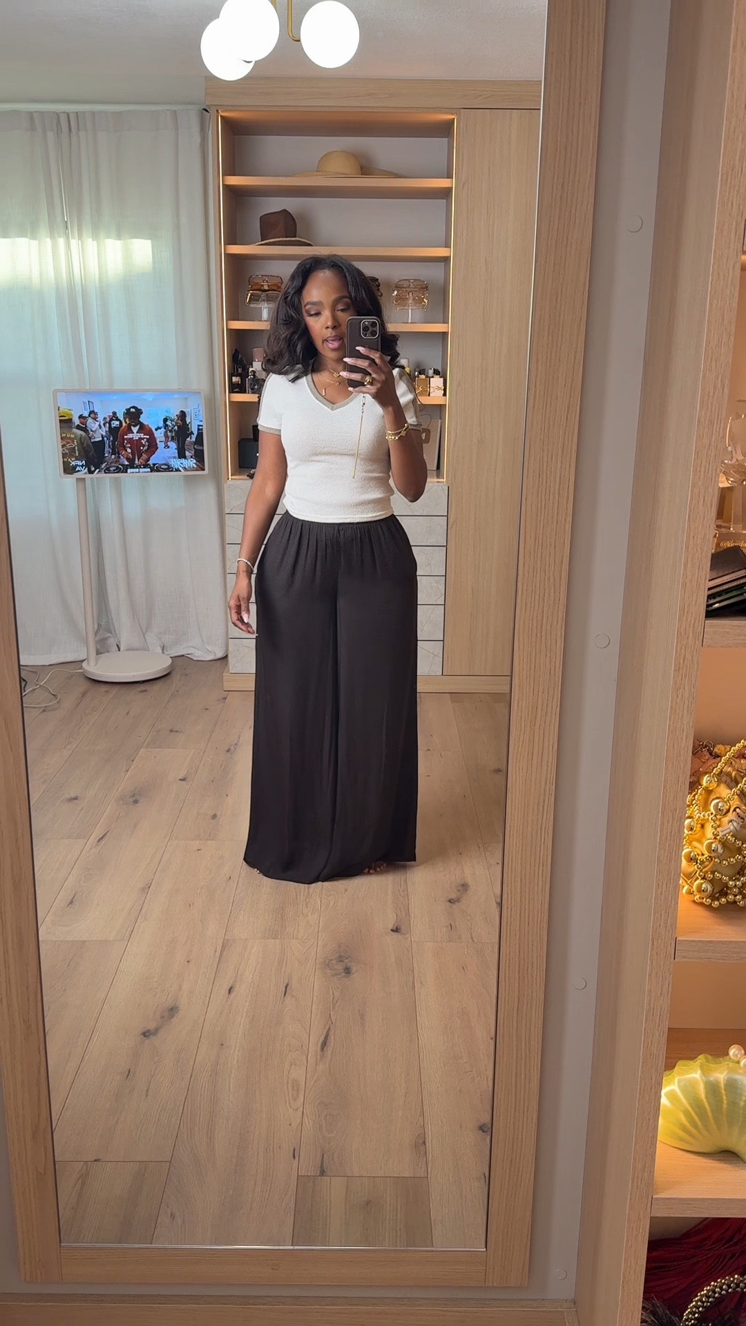 Hi babes!  

Okay this pant is EVERYTHING. — flowy, lightweight, and snatches the waist while still giving that relaxed, effortless fit. If you’ve been looking for a flattering black pant that actually moves with you and doesn’t cling… this is it.

I paired it with a simple fitted top and gold jewelry for that clean, elevated look — very YSL energy without the YSL price.

These are a top seller right now and I’m telling you now — high sell-out risk. This exact silhouette is going viral because it works on every body type and instantly makes an outfit look styled.

At this price point, this is a no-brainer. This is that throw-on-and-look-put-together piece you’ll wear on repeat, so the cost per wear drops fast.

Where to wear:
• Work  
• Brunch  
• Travel days  
• Everyday elevated looks  

Everything is linked below ✨  

📏 Measurements: 5’4”, 140 lbs, 34D bust, 27” waist, 40” hips  

Follow me on Instagram and YouTube @kirasfashionfinds  