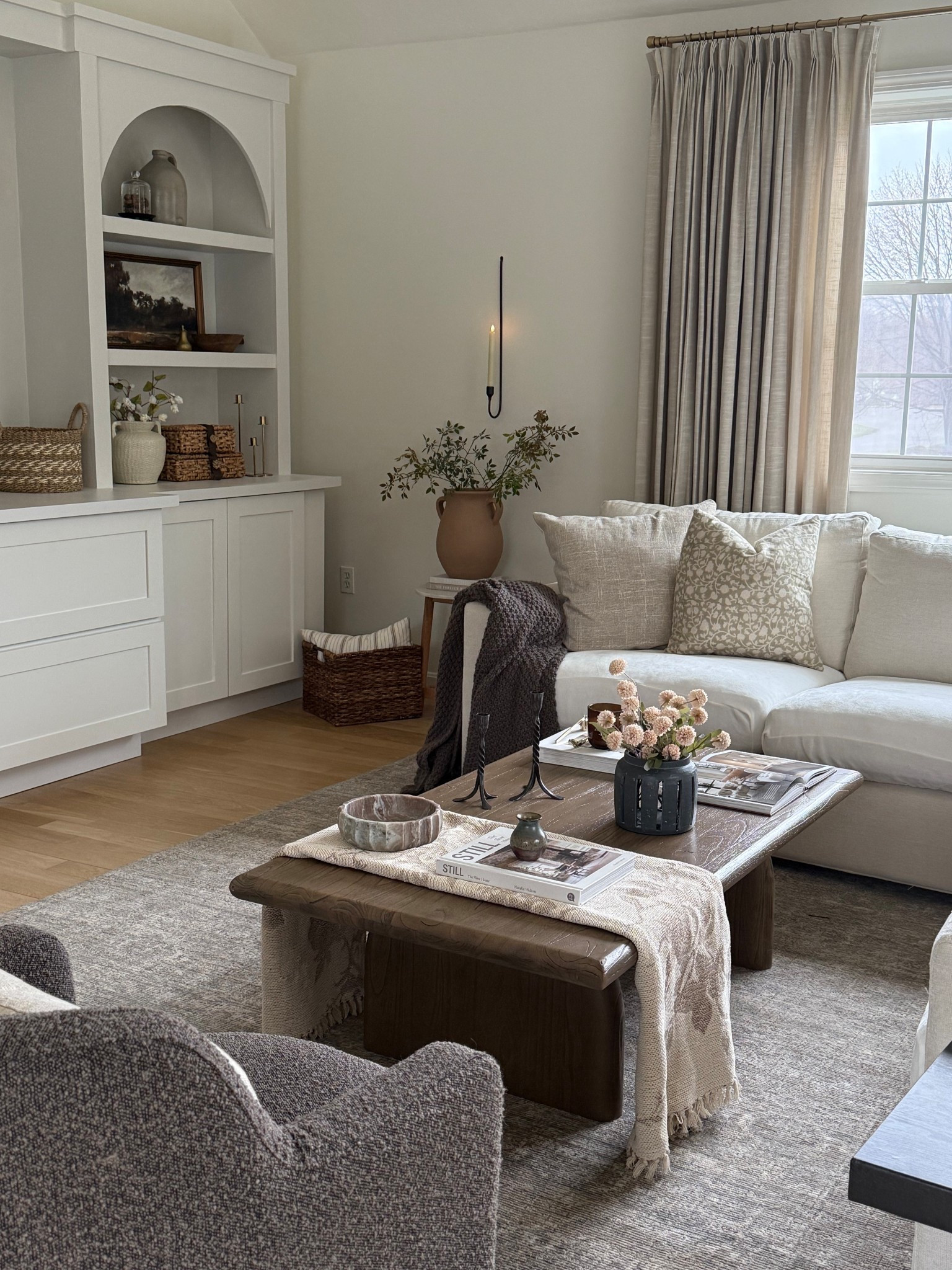 We have been adding to our living room over the past few months and I am really happy this area feels complete. Calm, cozy and warm to relax after a long day. 

#LTKHome