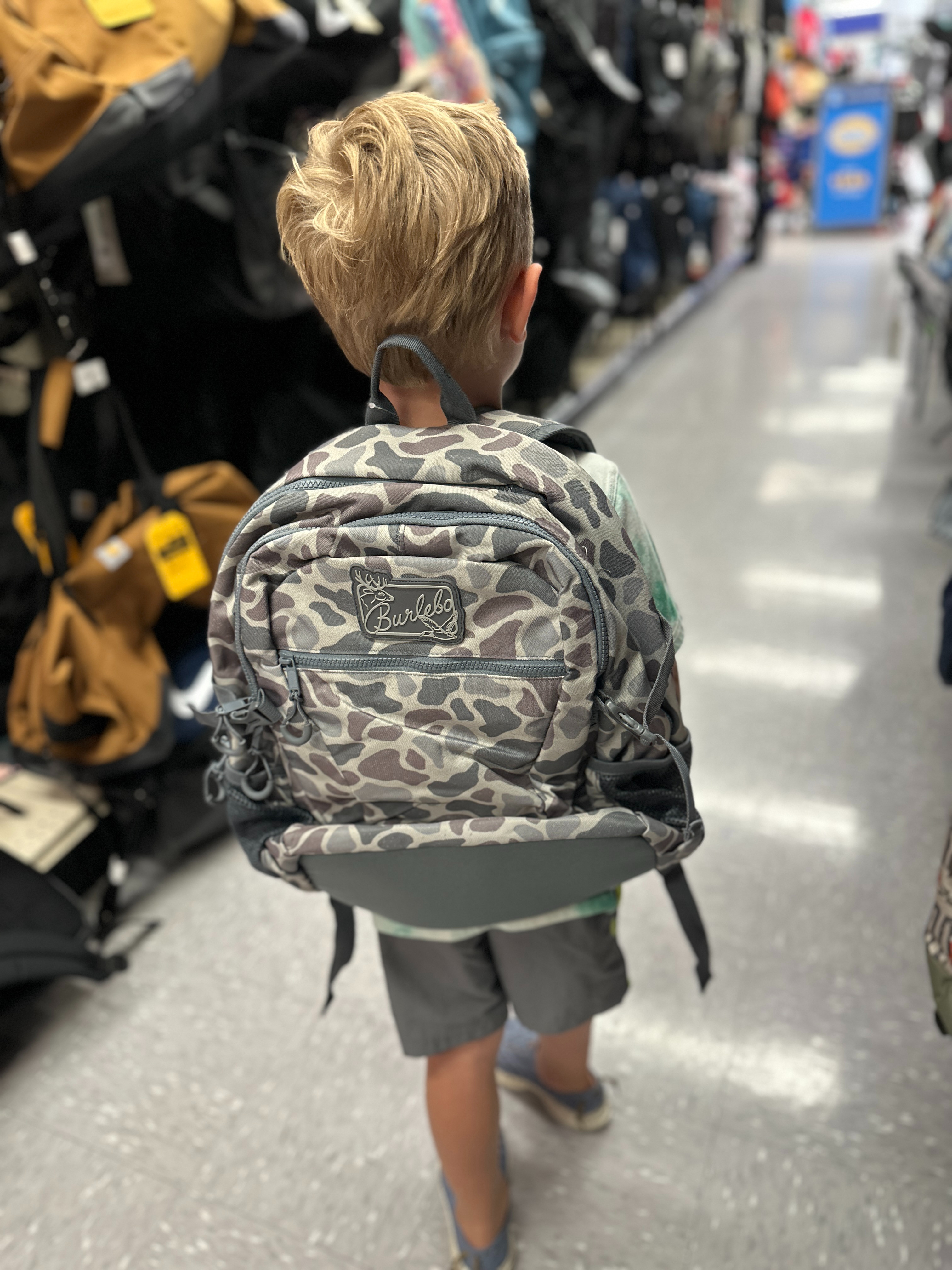 it was sooo hard for him to pick a backpack! He ended up going with the grey! 

 #LTKKids