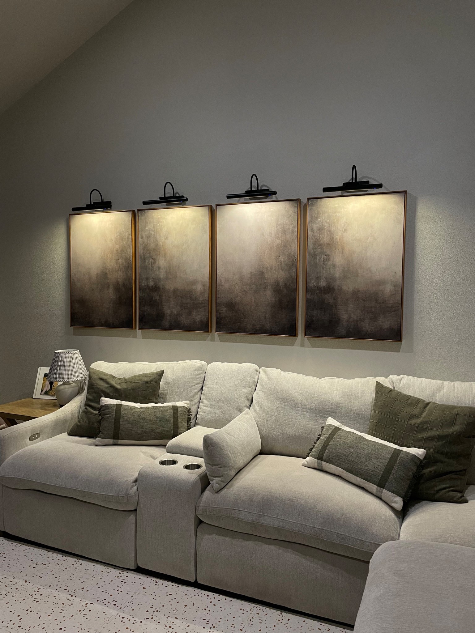 Cozy living room era✨ couldn’t link our couch, but it’s the Kennedy couch from Living Spaces. Love it so much!! It reclines and is modular. Also hung our gallery lights with command strips, everything linked🫶🏼

#LTKStyleTip #LTKFindsUnder100 #LTKHome