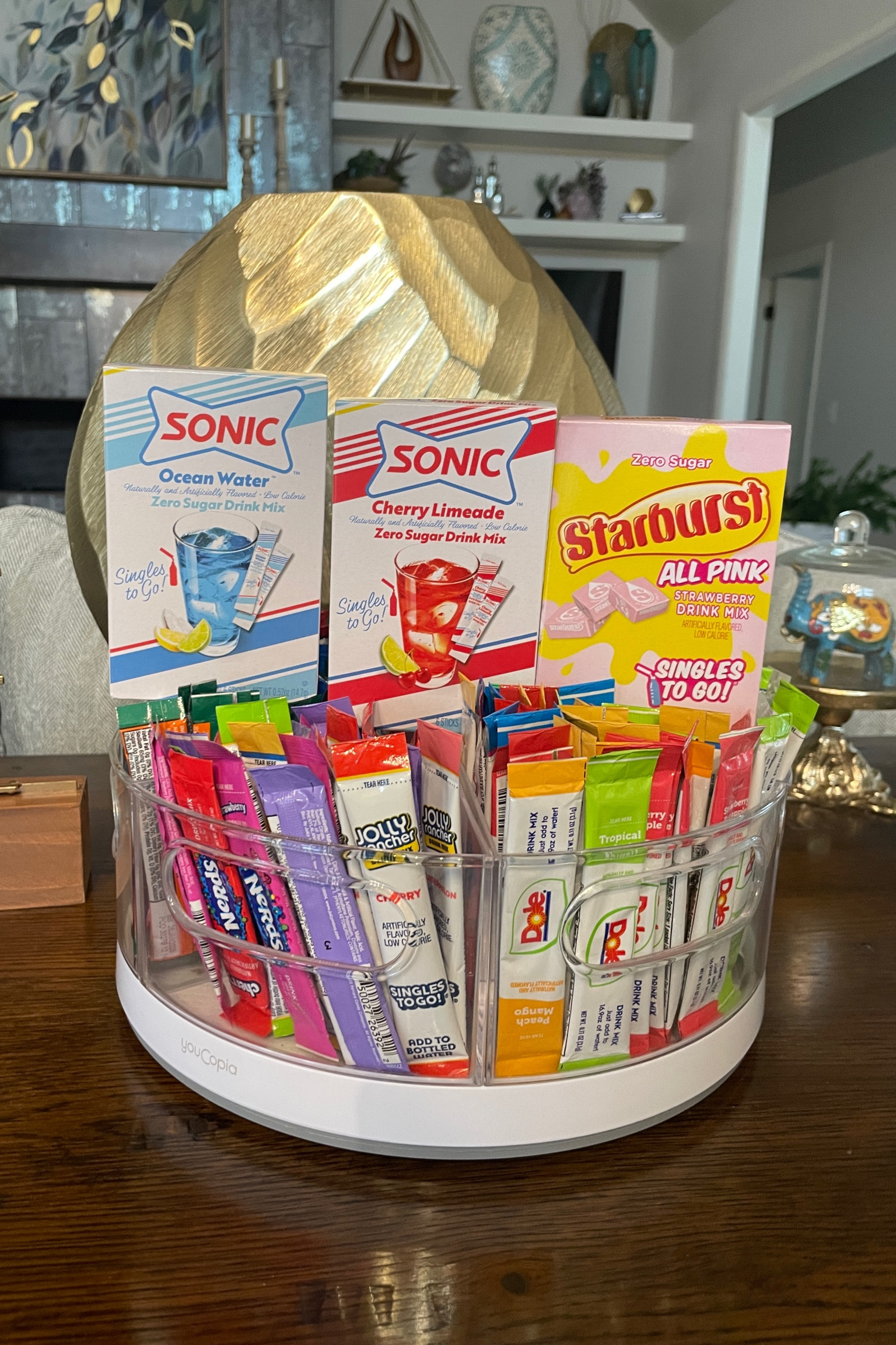 Water flavor packet restock. 
Here are three water flavors that I had to restock this week. 

I love the All Pink Starburst water flavor packets when I’m taking a bottle of water on the go. It has the perfect light strawberry flavor. 

And the two Sonic flavors are some that I use frequently. 

I’ve had several people asking for a link to my water flavor packet holder so I’m also linking that for you  

#LTKhome #LTKfindsunder100 #LTKMostLoved