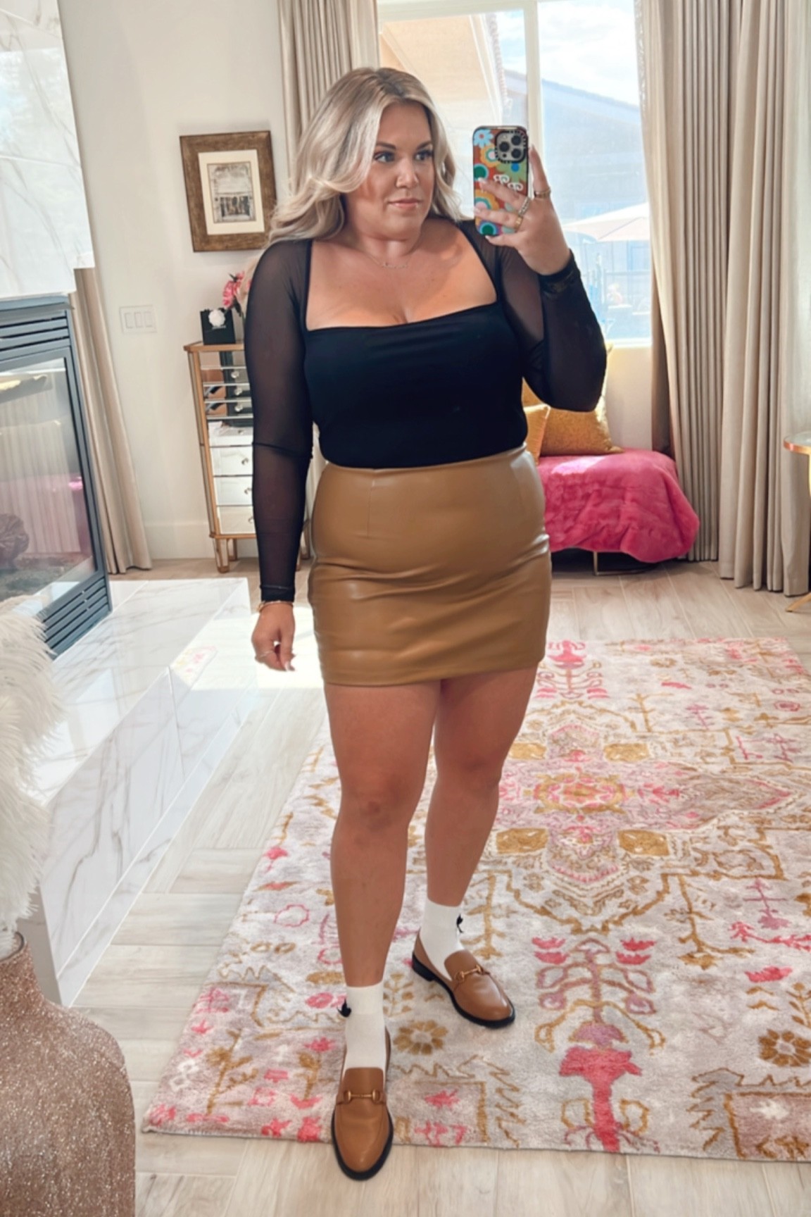 chic curvy fall look! wearing size xl in long sleeve black mesh bodysuit {wish i had the large!} and size large in faux leather skirt {wish i had the xl!} 

#LTKunder100 #LTKcurves #LTKSeasonal