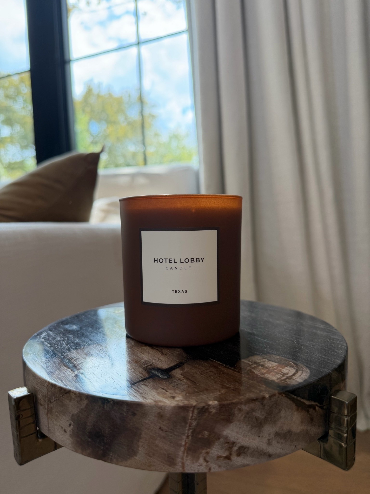 You need this candle. It brings that warm, elevated hotel feeling home.

#LTKHome #LTKSeasonal #LTKOver40