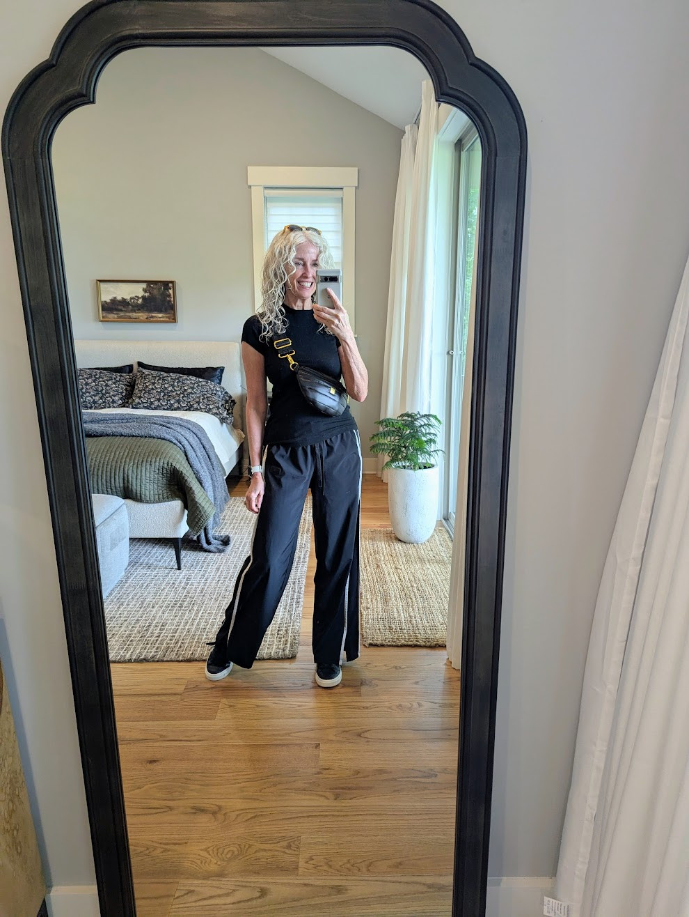Gosh, I love a track stripe pant. They are the secret to elevating a basic black tee and sneakers.  I'm wearing my summer weight pair and just ordered the new heavier weight version for winter. Wearing size small. #over60 #over50fashion #over50 #over60casualstyle
 

 #LTKOver40 #LTKFindsUnder50 #LTKStyleTip