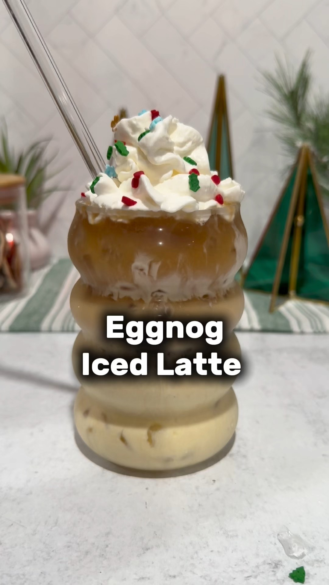 It’s tiiiiiime!!! 🎄🎅🏼 Christmas flavors are here and we are starting all the celebrations before thanksgiving this year!  An iced eggnog latte tastes like Christmas decided to chill out—literally. You get that classic eggnog flavor first: silky, rich, sweet, and warmly spiced with cinnamon and nutmeg. Then the espresso cuts through with this cozy, toasty depth that keeps it from being overly sweet. The ice makes everything lighter, smoother, almost like a holiday milkshake for grown-ups. It’s festive without being heavy, like the holiday season… but in a cup you can drink while Christmas shopping in 80° Florida weather. #coffee #icedlatte #coffeerecipes #drinkrecipes #eggnog 

#LTKfoodie #LTKdayinmylife #LTKHoliday