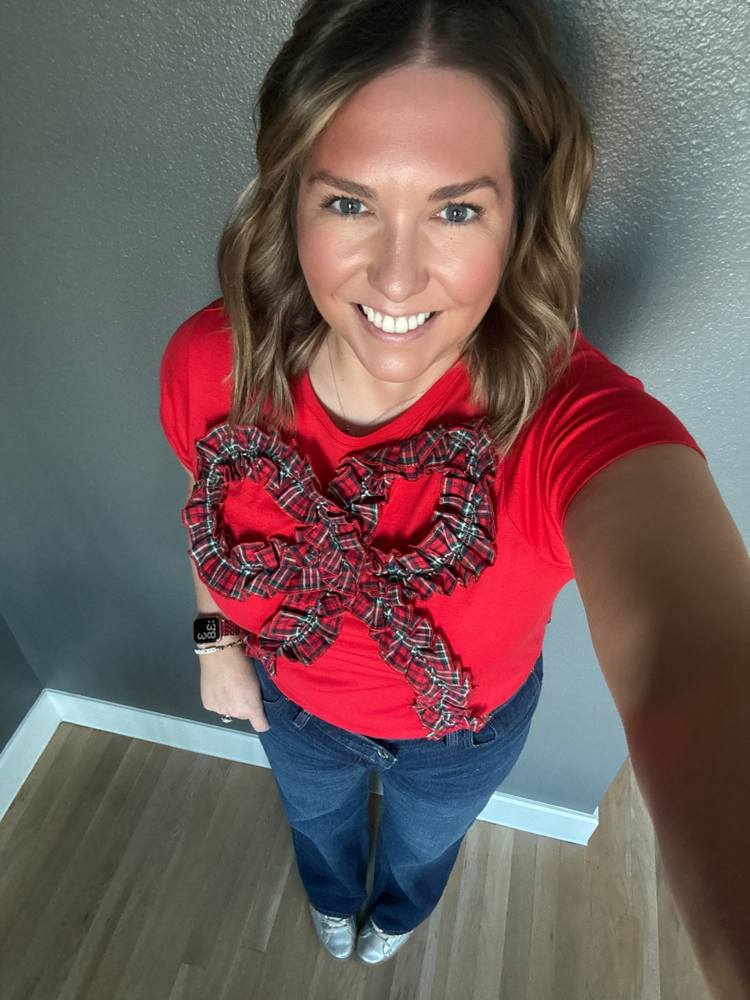 Headed to the Christmas Capital of Texas, Grapevine, for a fun evening getting in the holiday spirit. This T-shirt is so unique and so fun. I love the plaid bow detail. I paired it with some crisscross front jeans for a trendier look  

#LTKSeasonal #LTKMidsize #LTKFindsUnder100