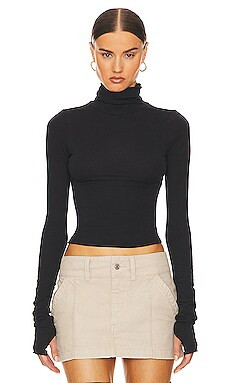 Helsa Long Sleeve Turtleneck in 2nd Skin Jersey in Black from Revolve.com | Revolve Clothing (Global)