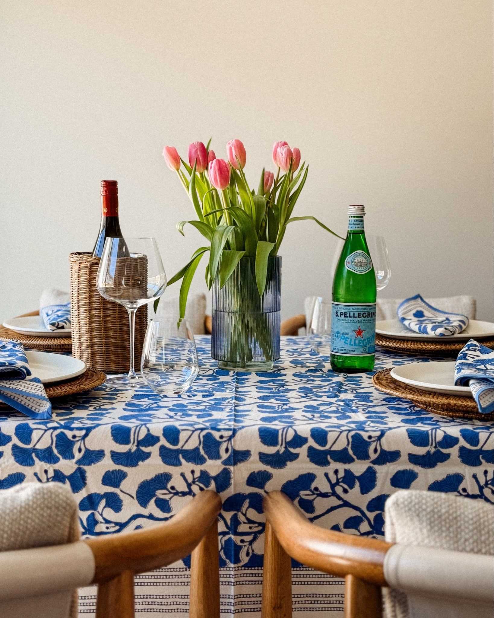 #AD | one of my favorite ways to make our home feel a little more special is setting the table ♥️ not for anything fancy, just to slow things down and enjoy the moment a bit more.

these pieces are from @pomegranate_inc, a table linen brand based in lexington, ky — which is just about an hour from where i grew up. i love getting to share brands that feel close to home, especially ones that truly believe gathering should feel easy and relaxed.

this ginkgo blue tablecloth with the matching napkins, along with their rattan chargers and wine cooler, instantly pulled everything together without overthinking it. it’s a good reminder that you don’t need a big reason to set the table. fresh flowers, simple textures, and pieces you’ll actually use go a long way.

if you’ve been wanting to make your kitchen or dining space feel more welcoming, start small:
• add one layer (a tablecloth or chargers)
• bring in something fresh like tulips
• use what you have and keep it simple

who you have at your table matters more than anything else! these just help create a space that feels warm and inviting.
 
#TablesThatTellStories #giftedbypomegranate 

#LTKstorytime #LTKHome #LTKSeasonal