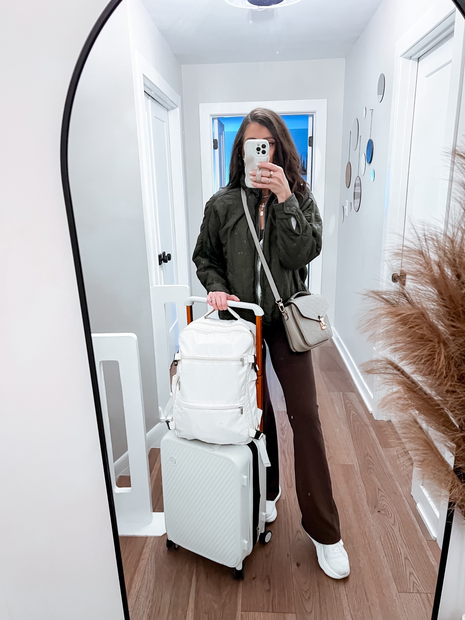 Easily one of my favorite travel outfits to date! The most comfortable flare, leggings, wrap, top, Hoka sneakers, and the best suitcase travel set!￼



#LTKTravel #LTKootd #LTKmomlife