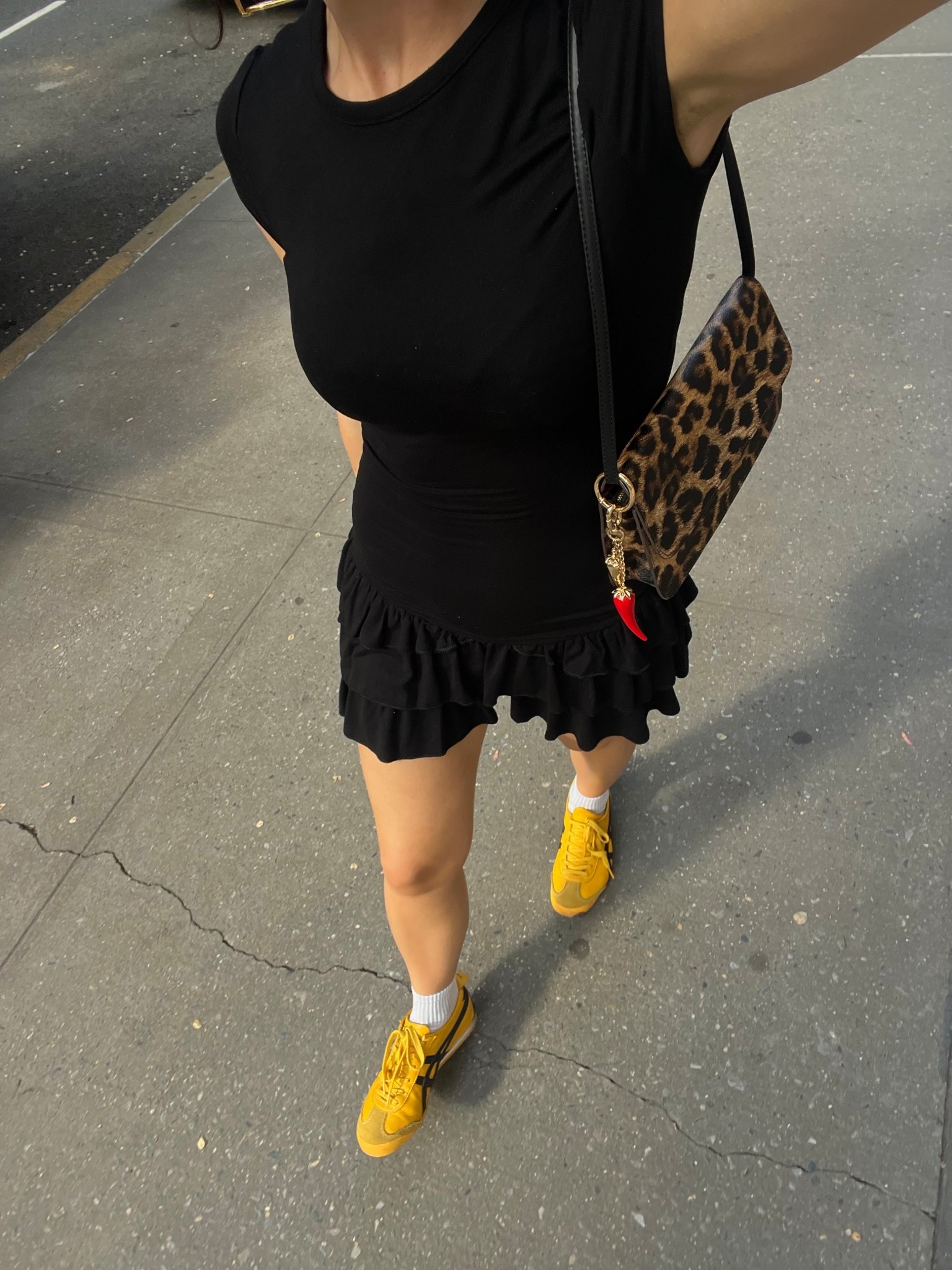 Nyc spring outfit, black ruffle dress, mini dress, yellow onitsuka tiger trainers, summer outfit

#LTKsummer #LTKspring #LTKuk