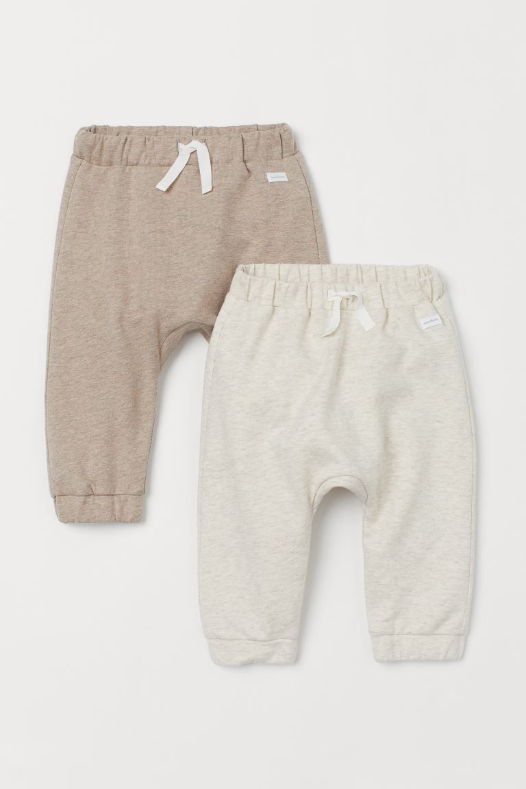 Soft sweatpant joggers made from an organic cotton blend. Elasticized waistband, elasticized hems... | H&M (US + CA)