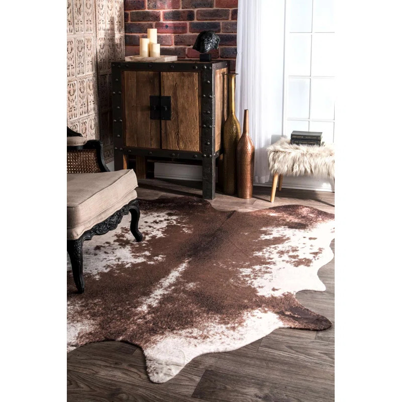 Mello Animal Print Faux Cowhide Area Rug in Brown/Ivory | Wayfair North America