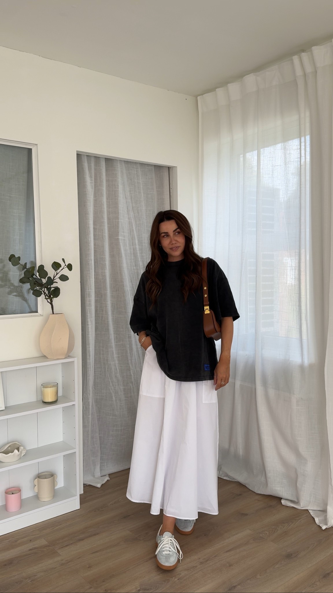 Styling a white structured maxi skirt with a dark grey oversized Tshirt and some adidas handball spezial trainers and a jw pei bag. It’s a gorgeous, simple summer outfit for everyday 

#LTKsummer #LTKeurope #LTKuk