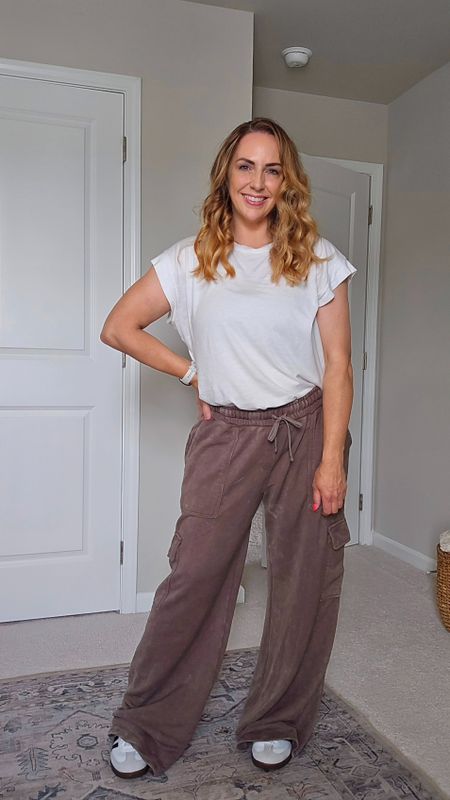 Target women's cargo drawstring sweatpants with pockets. Wearing size large, I'm 5'4 and they're a bit long. Sweatpants, cargo sweatpants, Target fashion, Target women's fashion, casual style, athleisure, activewear

#LTKFindsUnder50 #LTKStyleTip #LTKMidsize