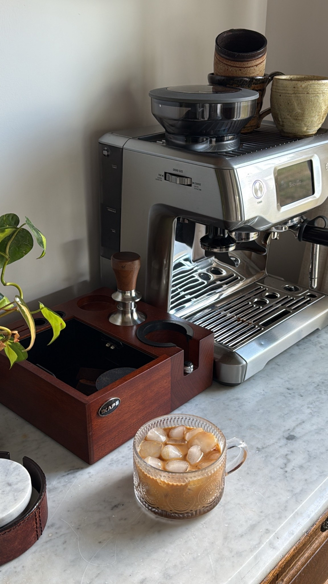 8/27/25 First pumpkin spice latte of the season 🍂☕️ Made my salty maple PSL at our cozy at-home coffee bar. Linking our full setup again — antique cabinet with marble top, floating shelves with gold railing, my Breville Barista Touch, espresso-making details from Amazon, and my Amazon coffee cups that give such a vintage, thrifted feel 🤍

#LTKHome