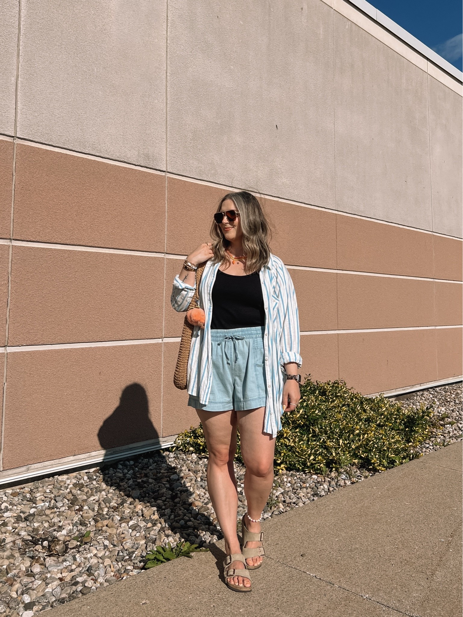 Easy summer outfit! Wearing L in the chambray shorts and basic black tank (Canadian tank link under “similar products”.) My striped button down is old from aerie, linked similar. Birkenstock sandals fit TTS

#LTKsummer #LTKmidsize #LTKsale