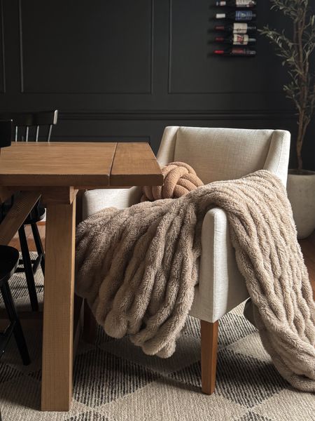 Dining room accent chair. 

Moody dining room, throw blanket, target style, extension dining table, black accent wall, black magic sherwin williams, boucle throw pillow 

#LTKhome #LTKfindsunder100 #LTKfindsunder50