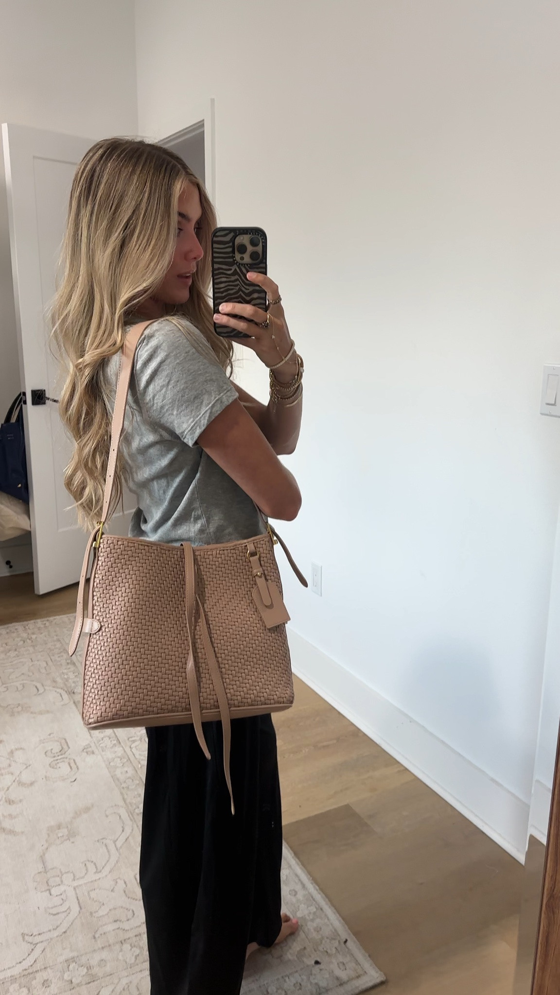 @Melie Bianco Casual yet refined, the Thalia bag features a woven finish and an adjustable strap for shoulder or tote wear. Complete with a detachable decorative tag, it's your go-to bag for chic daily carry.

#LTKootd #LTKTravel #LTKdayinmylife