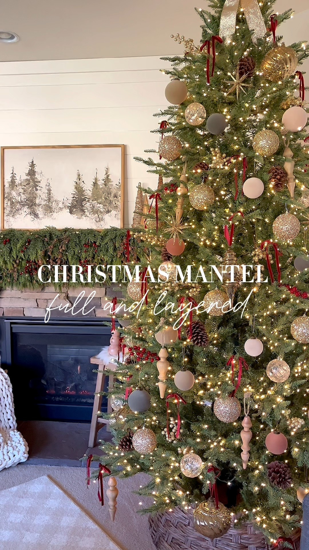 Christmas mantel!  Follow @lifeinmyarizonahome on Instagram for more holiday ideas and inspiration. 

This might be my favorite mantel yet with full layers of mixed greenery, pine cone stems, and red berries. This gives me the lush forest look I was going for that coordinates so well with the winter forest canvas above. 

Details:
6’ Norfolk garland x 2
6’ cedar garland x2
Draping pine stems x4
Mini pinecone stems x8
Dark red berry stems cut into sprigs 
Red velvet ribbon tied at each end
Red and green velvet stockings 
Winter forest canvas in the 36x24 size with the medium brown frame 
Wood and woven trees on each side  

#manteldecor #christmasmantel #christmasdecor #christmasgarland #holidaystyling

#LTKHoliday #LTKSeasonal #LTKHome