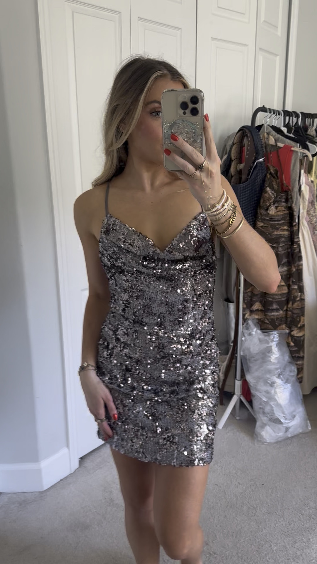 Forever 21 sequin cowl neck mini dress size XS. A knit mini dress featuring allover sequin embellishments, a cowl neck, adjustable cami straps that form a crisscross back design, open back with concealed zipper closure, and fit and flare silhouette

#LTKHoliday #LTKFindsUnder50 #LTKWatchNow