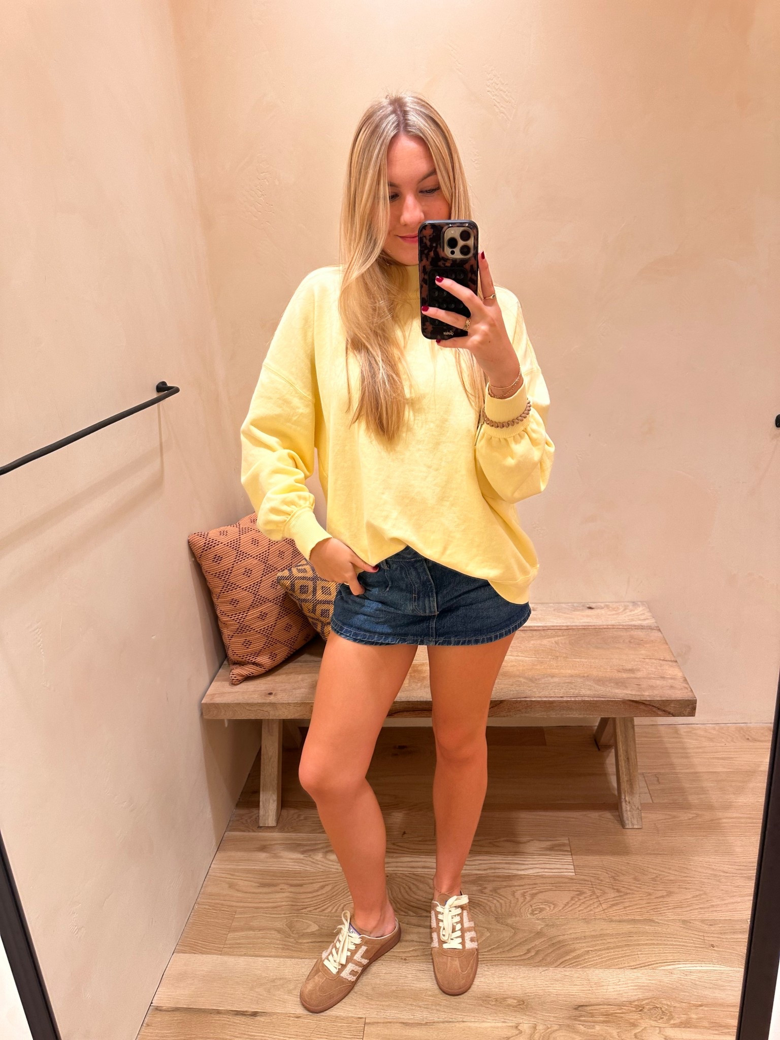 yellow mock neck sweatshirt!!! with my fav denim skort from free people! also just got my dream mules in!!! sneaker/mule

#LTKShoeCrush #LTKCyberWeek #LTKFindsUnder100