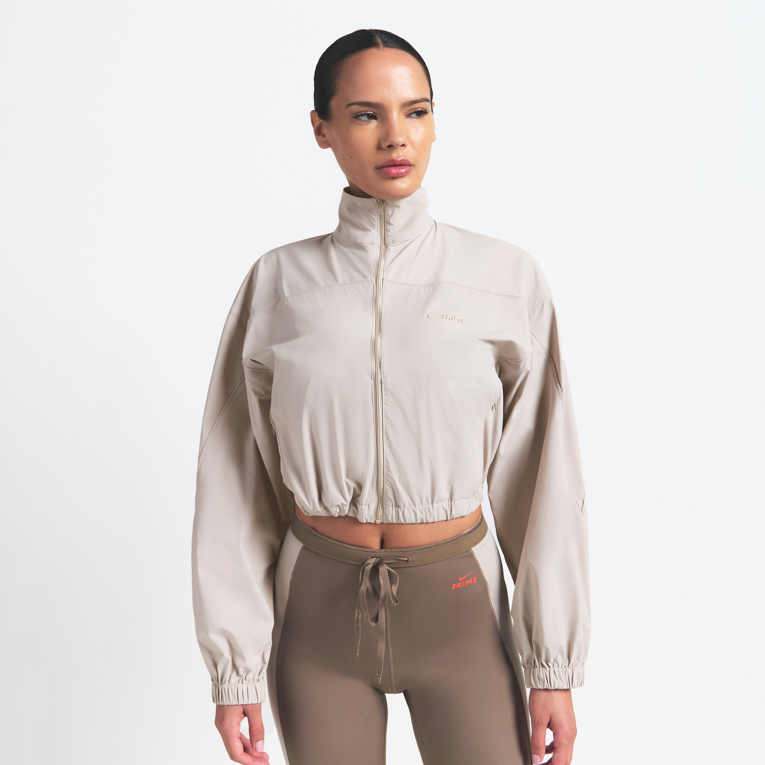 Nike Women's SKIMS Woven Nylon Crop Jacket in Brown | TPZUP3561-STO | Nike (US)