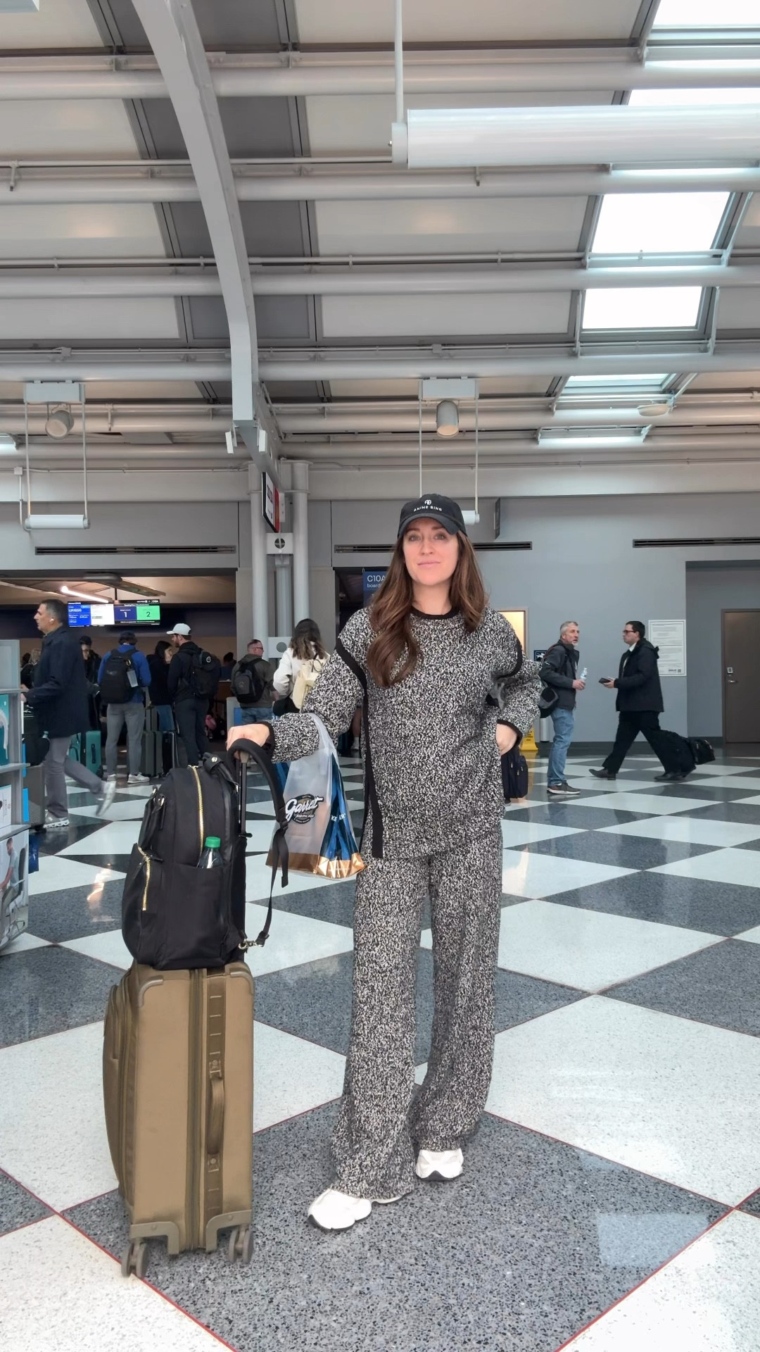 Airport travel outfit (19 weeks pregnant)- My little sweater set is SO COZY + 44% off and an additional 22% off today! I’m wearing a small in both pieces. Pants run a little long/big so if in between sizes, size down. 

#LTKBump #LTKootd #LTKTravel