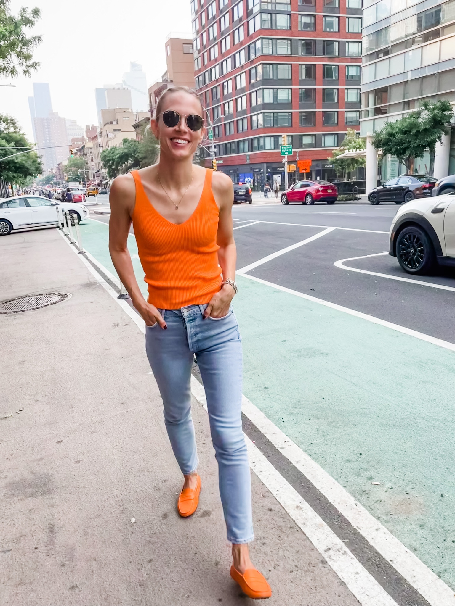 Summer in the city! Linking lots of orange knit tops perfect for summer! 🍊 

#LTKunder50 #LTKsalealert #LTKSeasonal
