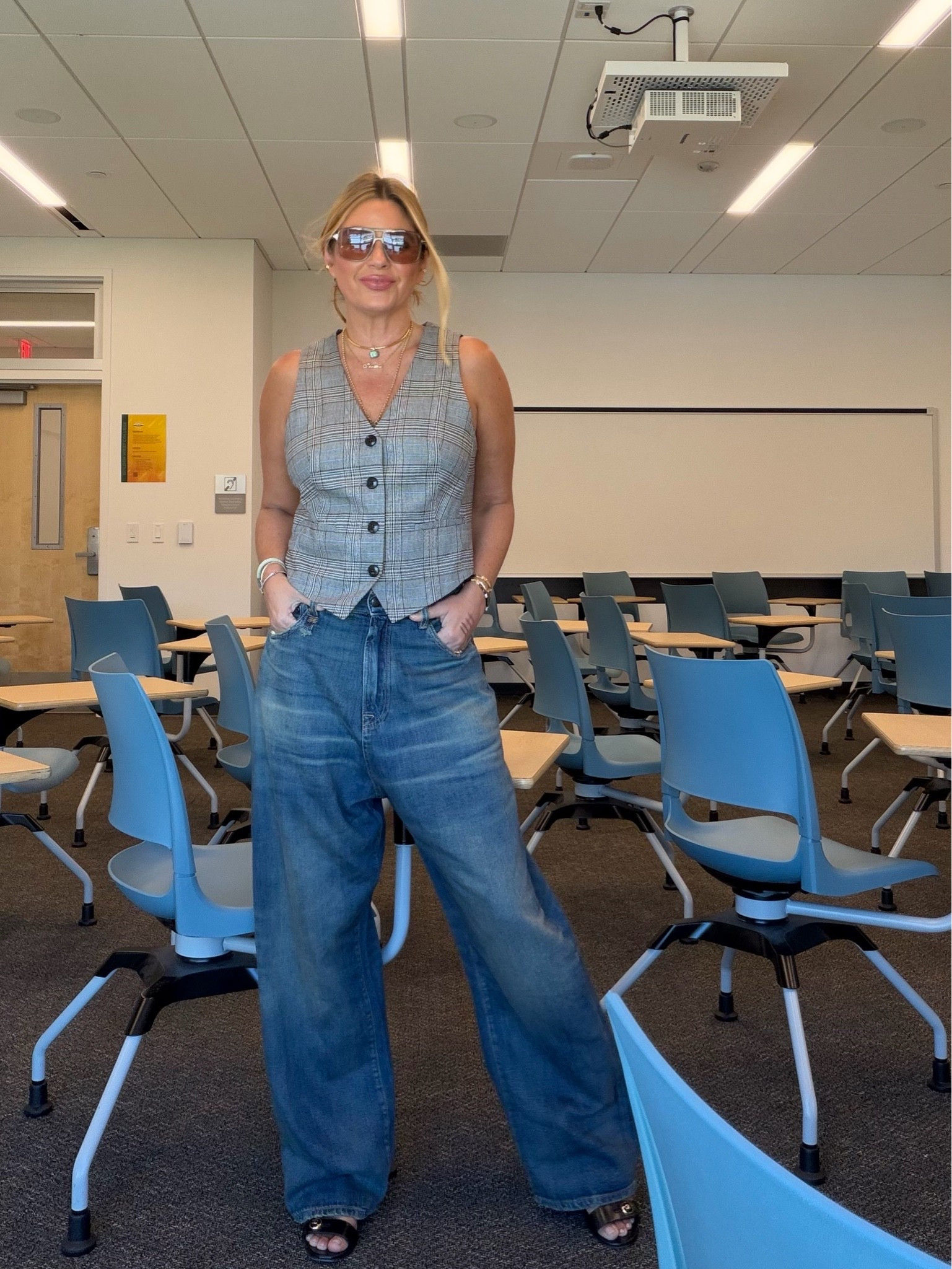 OOTD on campus…so glad you’re here🤍
Jeans: 28
Vest: medium
Sandals: TTS
Hair: Sea Glass + Day Rate hair pin in camel 
Tom Ford Sunglasses 
Anfisa lip liners (not linked)
Armani lip power 503
Dior skin tint 3.5 N 
YSL cream blush in hot mauve 
Buff revive nail oil