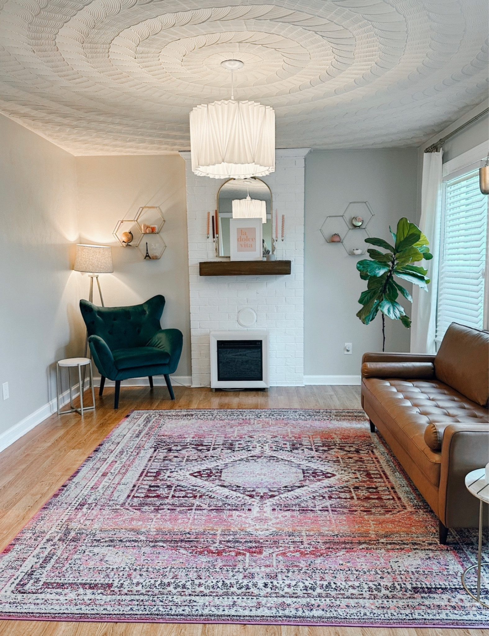 Interior design ideas for small homes- Pink rug, cognac couch, fireplace and mantle


#LTKstyletip #LTKhome