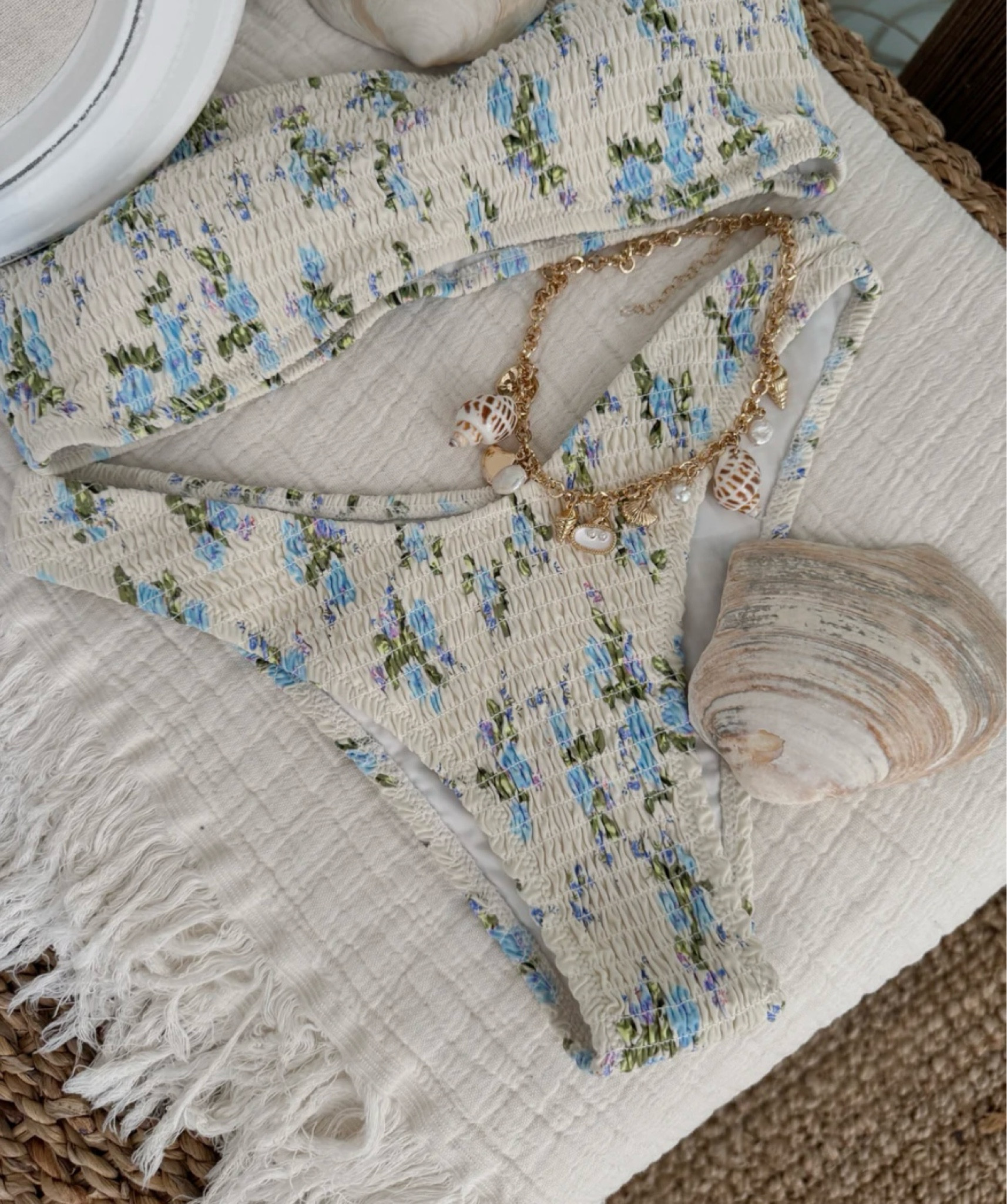 Making waves in style 🌊💙 This scrunched floral bathing suit is all about flirty details and coastal charm—perfect for poolside lounging or seaside splashing.

#LTKTravel #LTKParties #LTKSwim