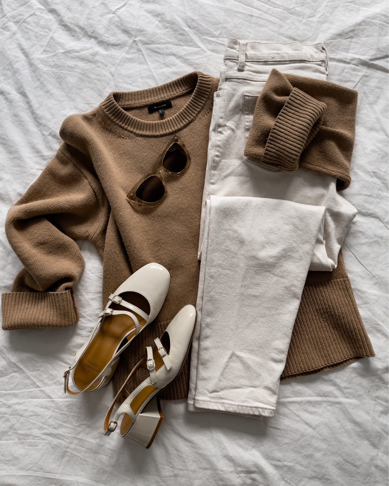 Spring Wardrobe Staples 🌞 

*mary jane shoes from Sézane (these Paula Babies fit true to size! I’m wearing my regular size, EU 39)
*cat-eye sunglasses from YSL bought on My Theresa (get 10% off if it’s your first order!)
*camel crew-neck jumper (Massimo Dutti, it’s old and I’ve linked alternatives)
*white denim (old mom jeans from Mango, I’ve linked alternatives)

#LTKfindsunder100 #LTKshoecrush #LTKstyletip