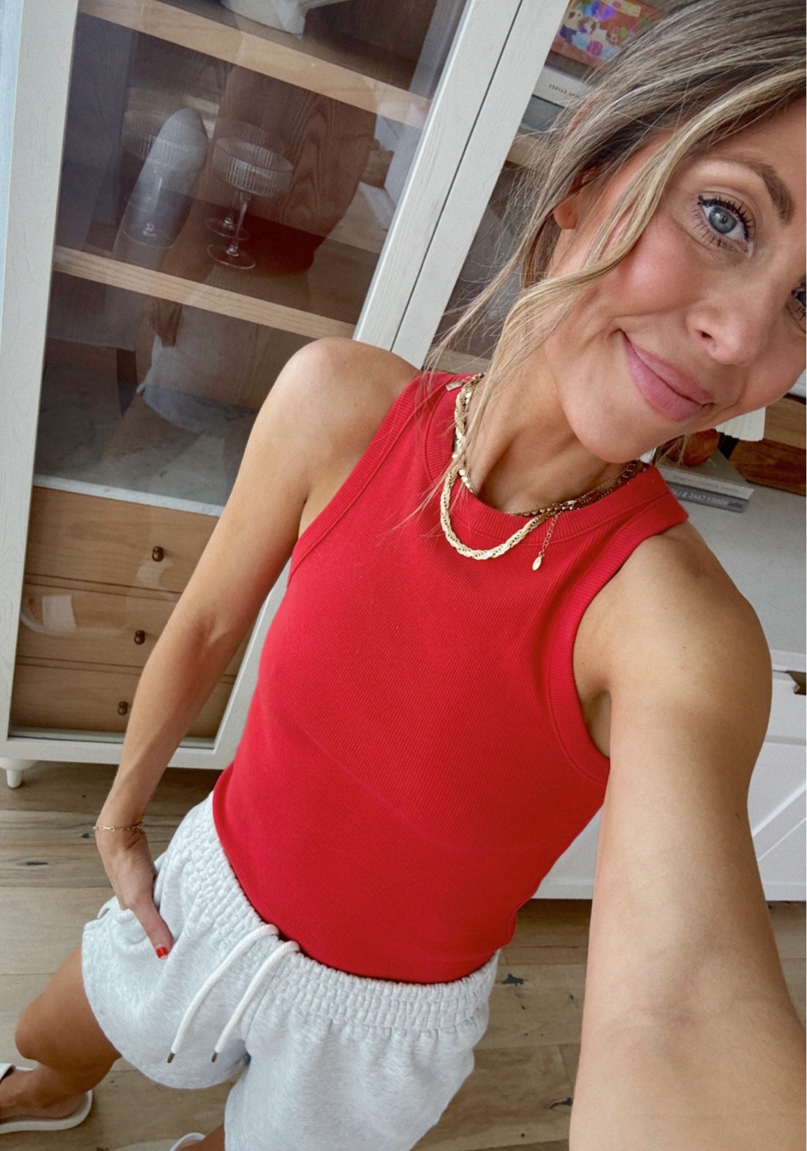 Sized up in the red tank and small shorts! Anthropologie cabinet  




#LTKFindsUnder50 #LTKHome #LTKSaleAlert