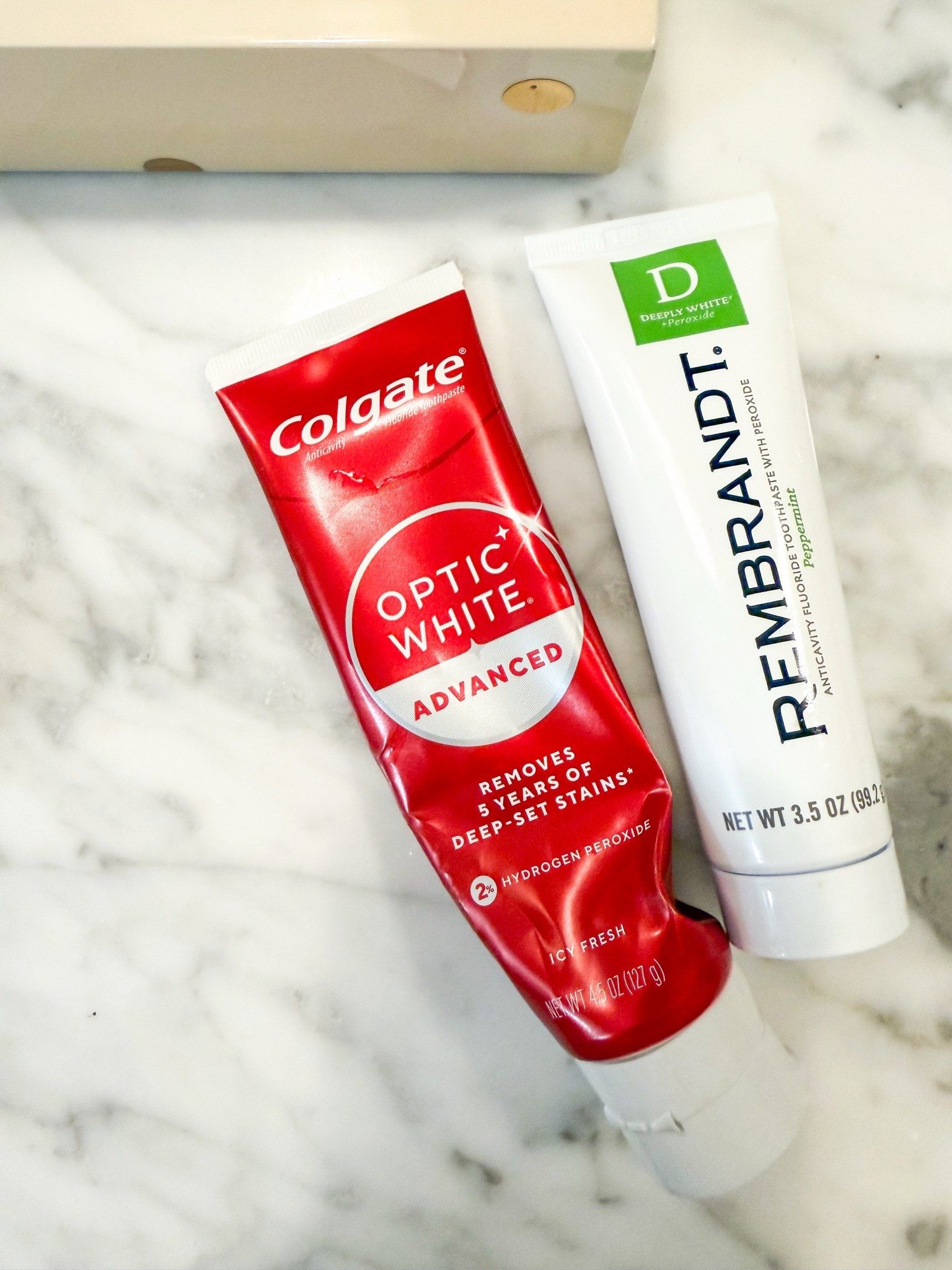 two whitening toothpastes — Jeff uses Colgate while I’m a Rembrandt girl and yes mine works better ;)