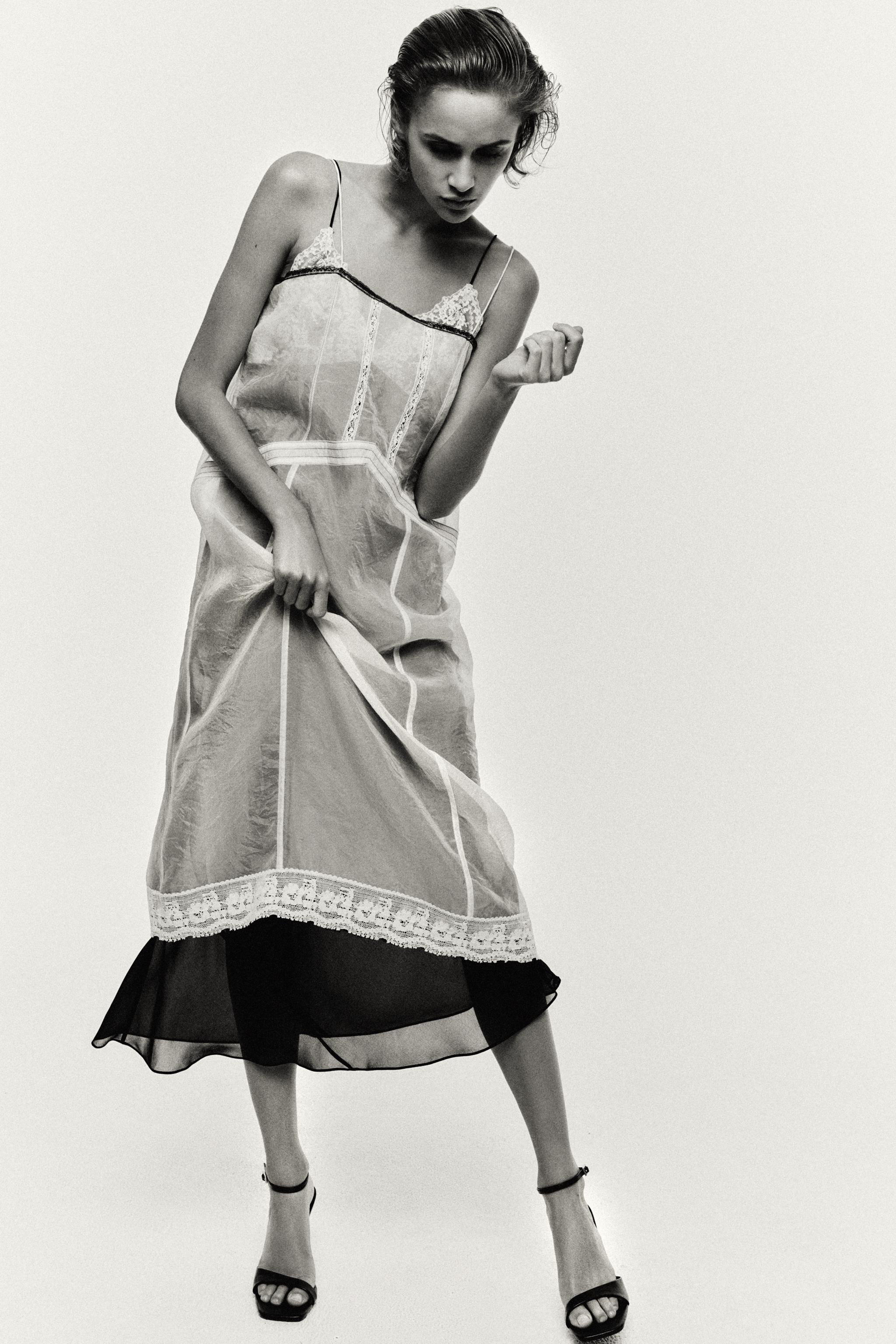 Model height: 173 cmLong V-neck dress with contrast lace and thin straps. Features organza-style ... | Zara UK