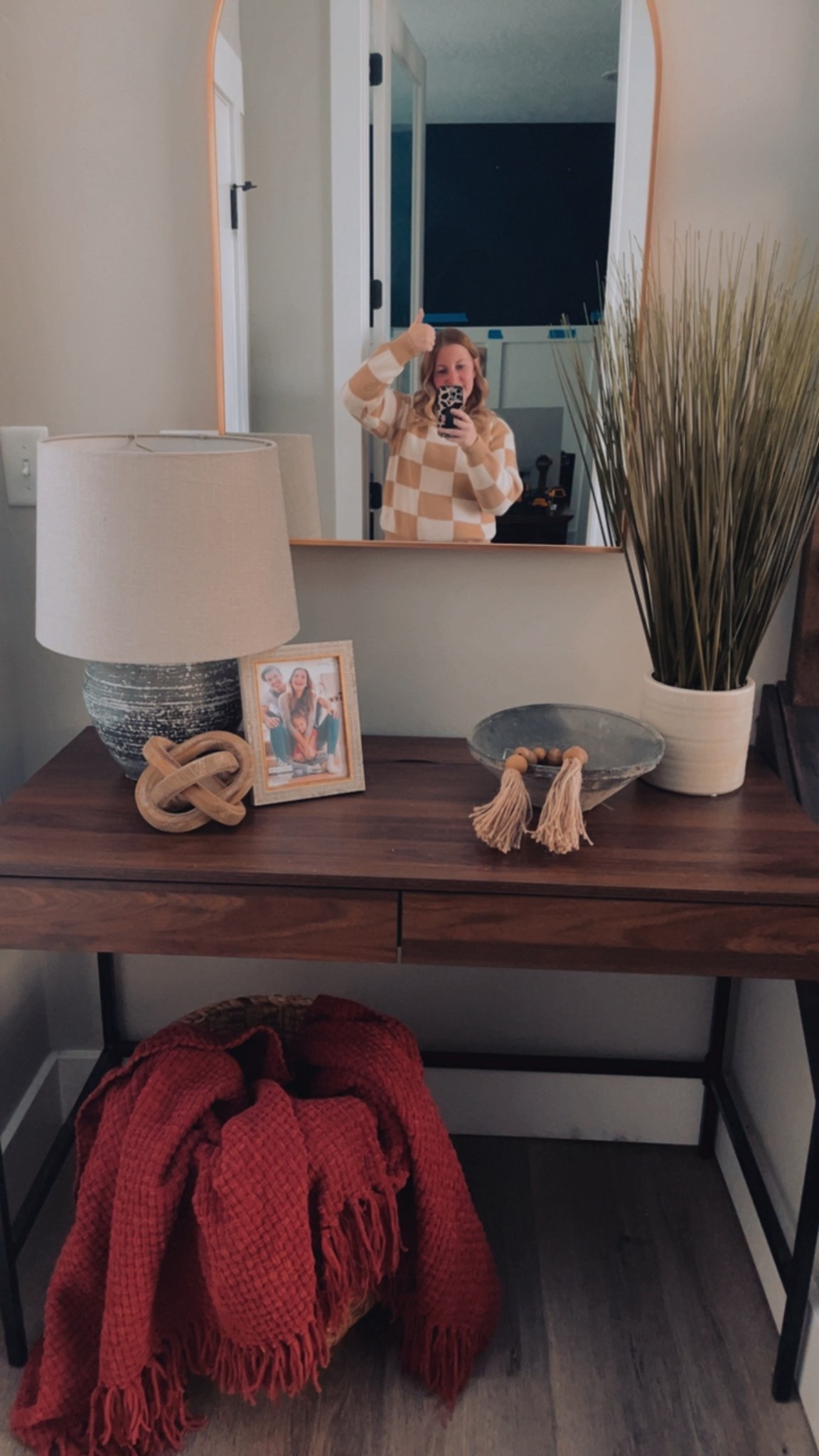 Vase aka lamp is from hobby lobby along with the wooden knot and the wooden beads. The tall plant, picture frame, blanket and basket are from Homegoods


#LTKHome #LTKFindsUnder50