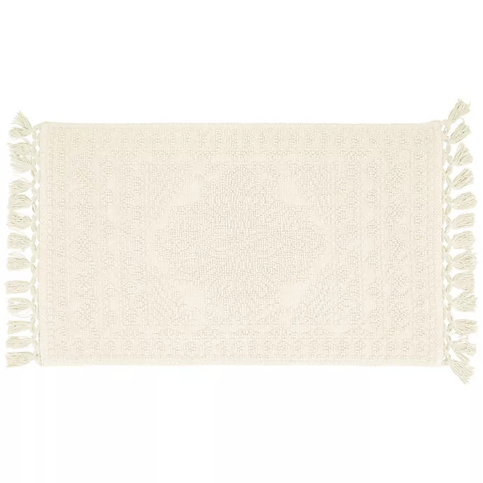 French Connection Nellore 20" x 34" Fringe Bath Rug in Ivory | Bed Bath & Beyond