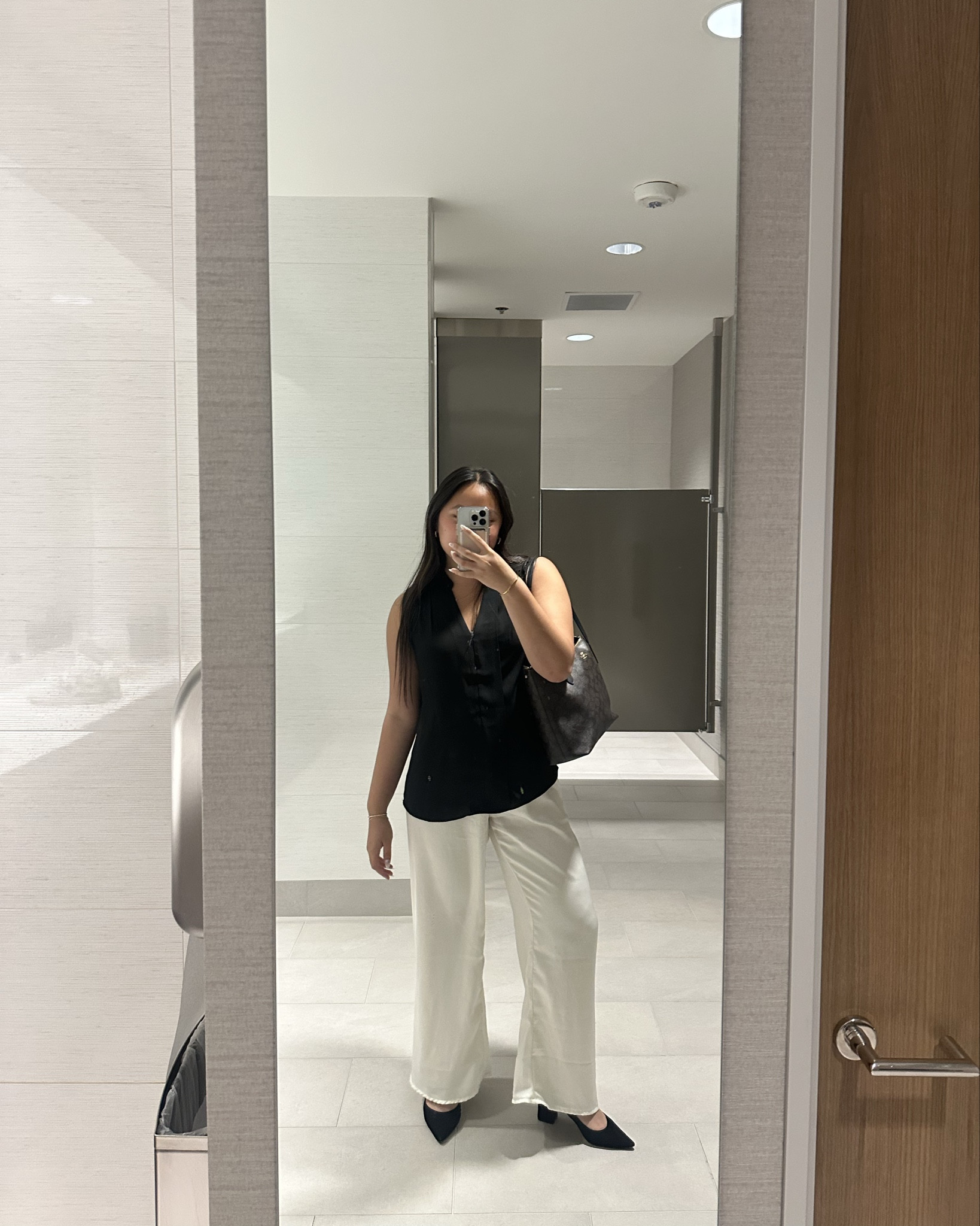 flowy and comfy for the work day

this black shell from WHBM is actually a MUST HAVE in your closet. perfect for work and just so classic you can actually wear it for the rest of your life. pants are deacon - butter from Peppermayo. a summer staple for sure!!

xoxo, jo

#LTKWorkwear