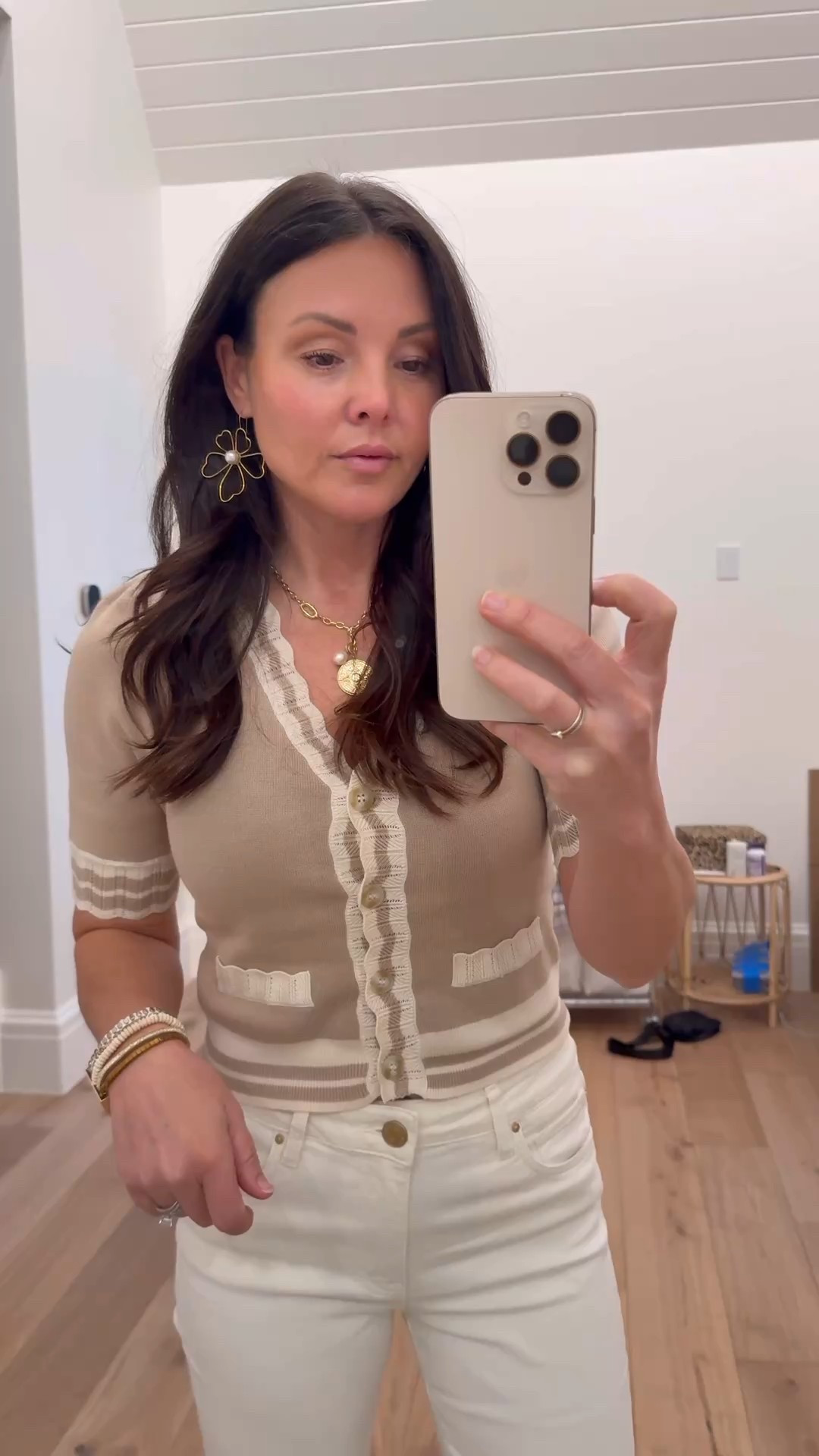 Spring outfit with scallop detail and cream jeans that fit perfectly on sale. Raw hem so you can cut to your perfect length. 

Woven slides that a few soo comfy. 

Gold flower earrings , bracelet on sale, and similar necklaces linked. Mine is older. 

#LTKSaleAlert #LTKSeasonal #LTKShoeCrush