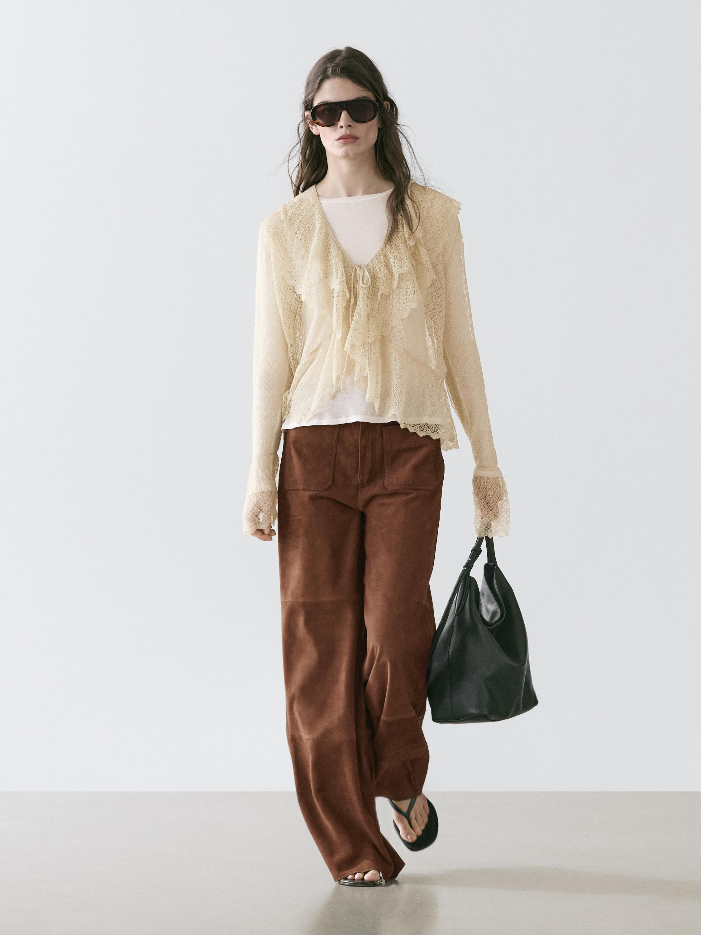 VIEW LOOK
Suede leather wide-leg trousers with pockets

 £349  Colour:  Brown  Add to basket | Massimo Dutti UK