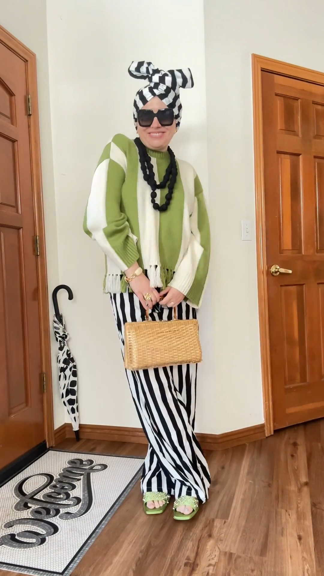 Tropical Luxe - Look 2
A curated style series

This sweater was love at first sight. The color. The stripes. The little fringe detail….I had to have it. It’s one of these statement pieces that seemingly goes with absolutely everything, as well. It comes in navy also - and I’m legit tempted. I’m loving this color green for 2026, though, so it won out.  Fit is oversized and suuuuper comfy.

If I had to pick my favorite season it would absolutely be RESORT! Okay, so it’s a clothing season and not a weather season- fine, be more specific with your questioning next time 😉 . But truly, if I could only wear one type of clothing again it would be beach-ready resort pieces. Too bad I live in a land-locked state. lol

Sweater - Simon Miller
Scarf/turban - Twisturban by Römer Millinery 
Necklace - Dillards
Bag - Vintage
Pants- (thrifted) Pretty Little Thing
Shoes - Dillards
Sunglasses - Gucci
Earrings - Vintage Givenchy
Bracelet - Vintage J Crew
Ring - Rocksboxx

Comment SHOP below to receive a DM with the link to this post on my LTK ⬇ https://liketk.it/5Zquc #ltkseasonal #ltktall #ltkootd

#LTKootd #LTKMidsize #LTKTall