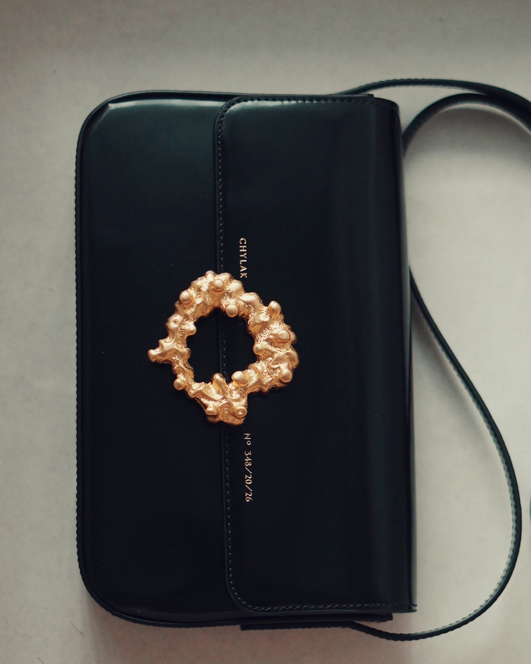The Bag That Started the Outfit

A structured black leather bag finished with a sculptural gold hardware detail. One of those pieces that instantly elevates even the simplest look.

black bag, designer bag, leather handbag, luxury accessories, statement bag, gold hardware, sculptural jewelry, minimalist style, elevated basics, timeless accessories, chic handbag, everyday luxury, capsule wardrobe, black accessories, fashion details, contemporary fashion, investment piece, luxury style, handbag collection, outfit essentials

#LTKsummer #LTKbag #LTKstyletip