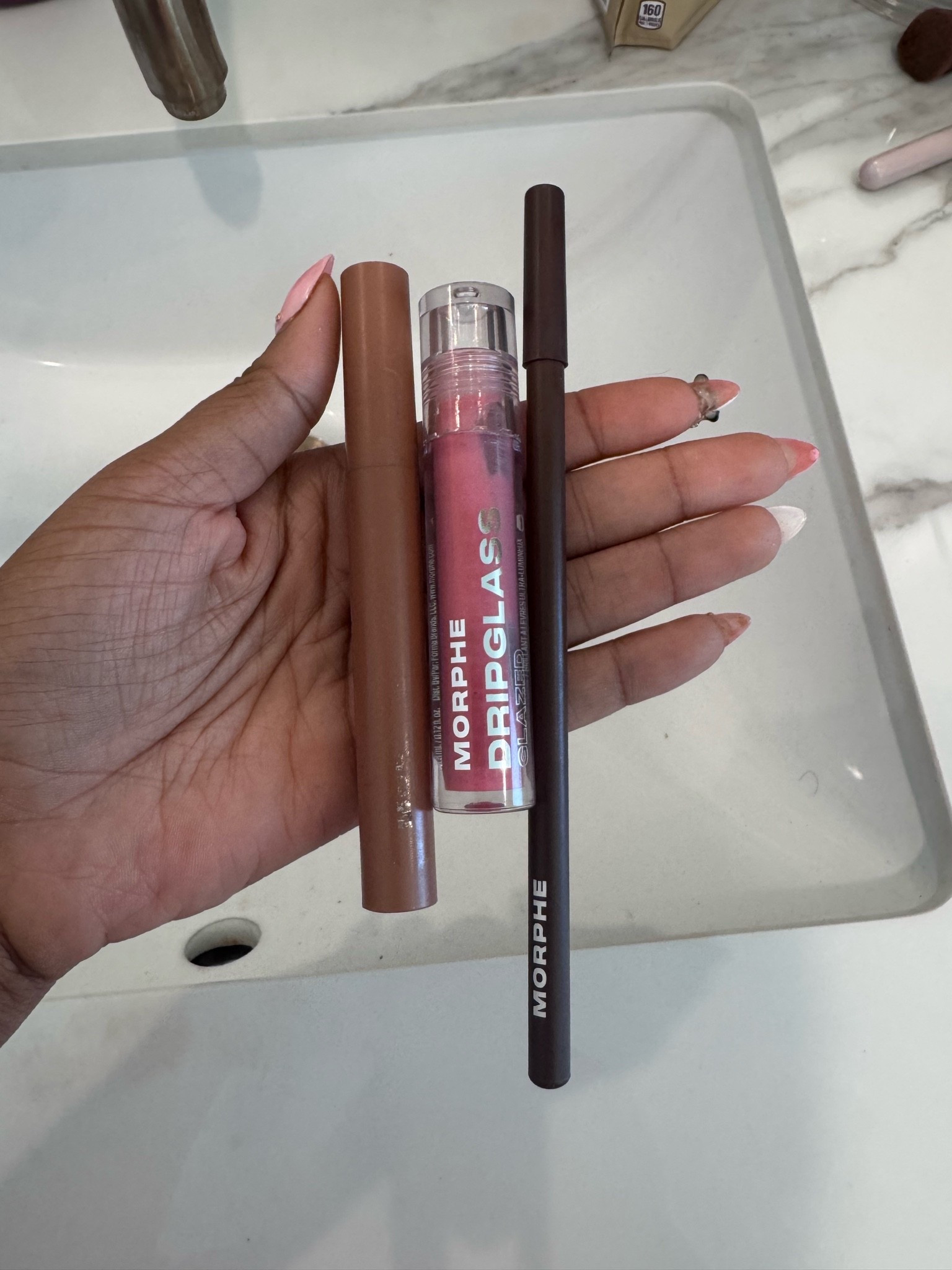 I get asked about my signature every day lip combo and it’s just these three products. 

Lipliner: trendsetter 
Lipstick: honey 
Gloss: pink mirror