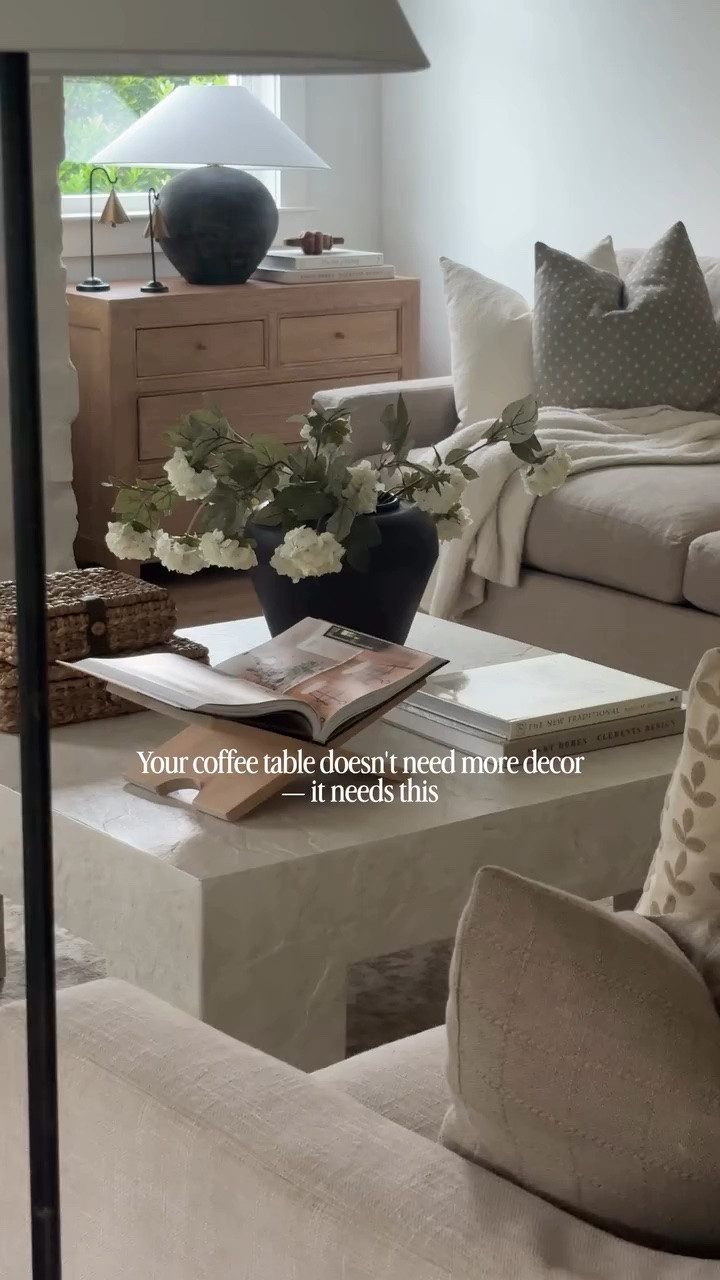 It probably just needs a little layering, texture, and balance. When I'm styling a coffee table for a client, I always include greenery, a stack of coffee table books, some sort of element that adds height like storage boxes or a book holder stand. 

The easiest way to make a living room feel more curated is simplifying what’s already there 🤍

Comment shop for the links! 

#coffeetablestyling #homedecorideas #livingroomdecor #neutralhome interiordesign cozyhome designerlookforless coffeeTableDecor homesweethome