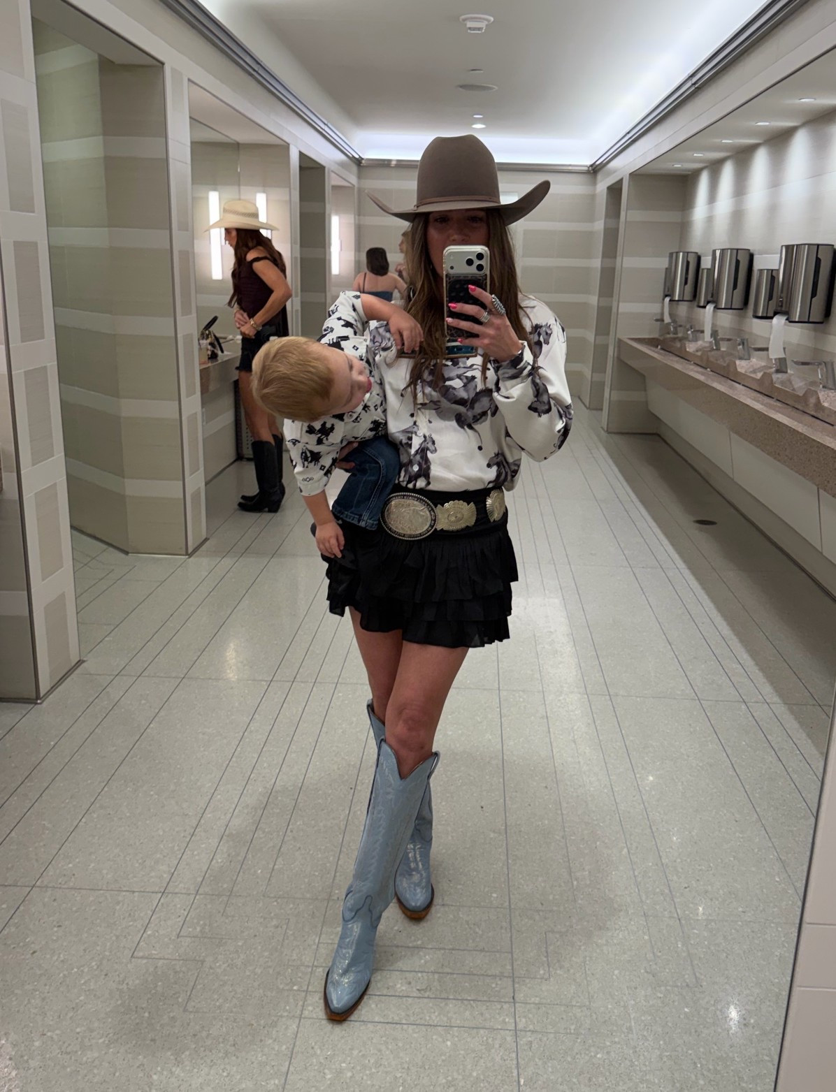 A moment for the indigo boots, the feral toddler, and a good ole bathroom selfie. These Lucchese’s are the indigo shimmer, they sell out quick.

#LTKmomlife #LTKootd #LTKgrwm