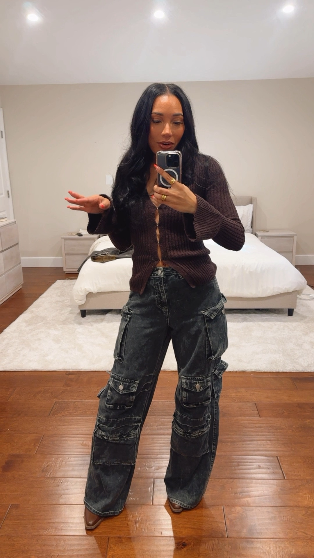 Cute casual dinner outfit! A cozy chocolate brown sweater, cargo pants, brown boots and chocolate faux leather jacket  