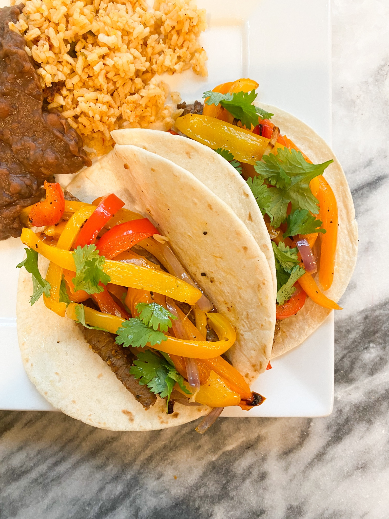Sheet pan fajitas. Kitchen tools below 😋 Recipe on my website https://www.thehomeandhammer.com/food/sheet-pan-fajitas

#LTKhome